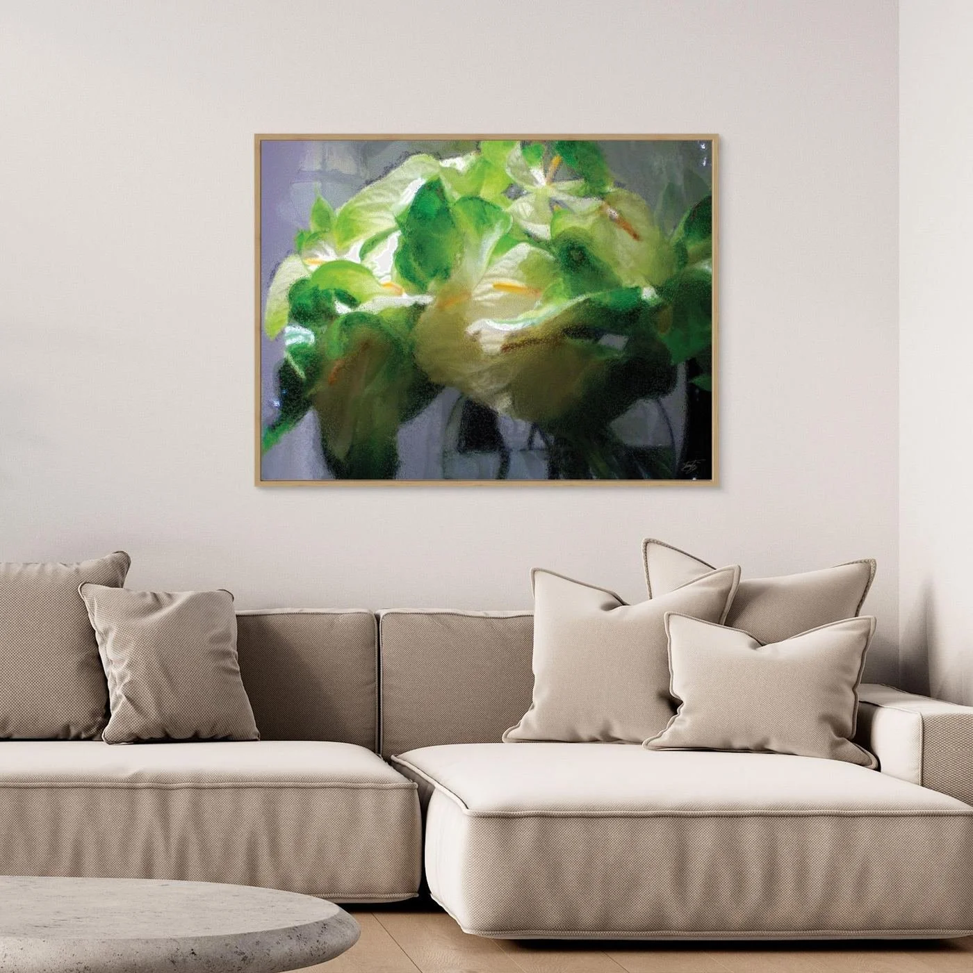 Abstract fine art print of a white and green calla lily bouquet with a heavily textured frosted glass effect, framed and ready to hang. Over grey couch