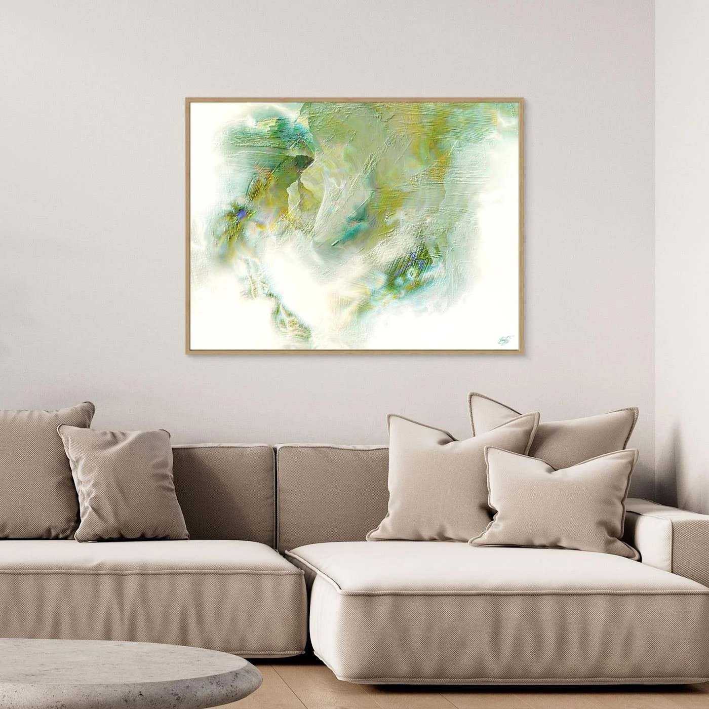 Minimalist fine art print showcasing heavy impasto brushstroke textures in soft sage, olive green, and beige tones on a bright white background, framed and ready to hang. Over grey couch