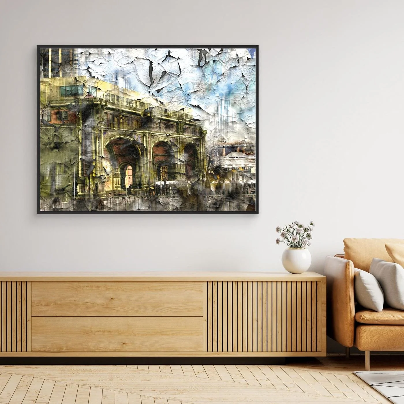 Abstract fine art print showcasing classical building arches with heavy cracked and distressed paint textures in gold, grey, and soft blue tones, framed and ready to hang. Over wooden console