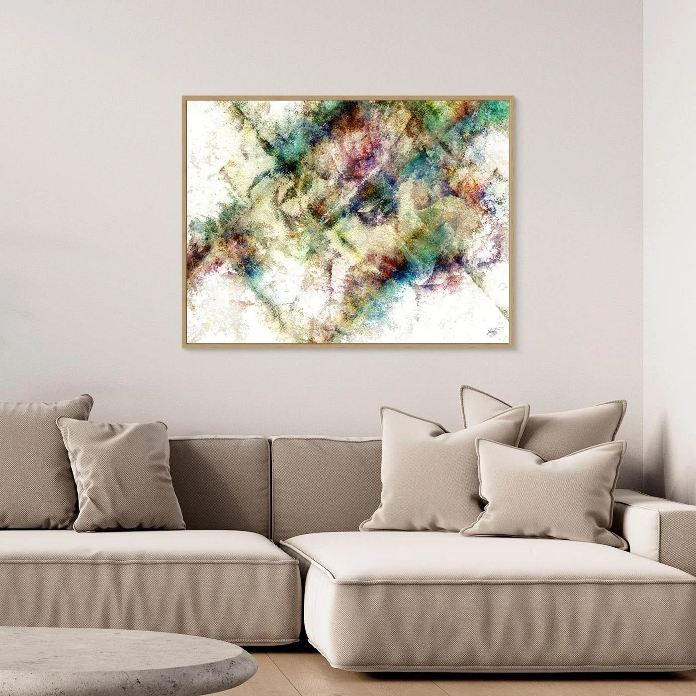 Abstract fine art print with heavy distressed textures and geometric overlays in green, gold, and burgundy tones on a bright background, framed and ready to hang. Over grey sofa