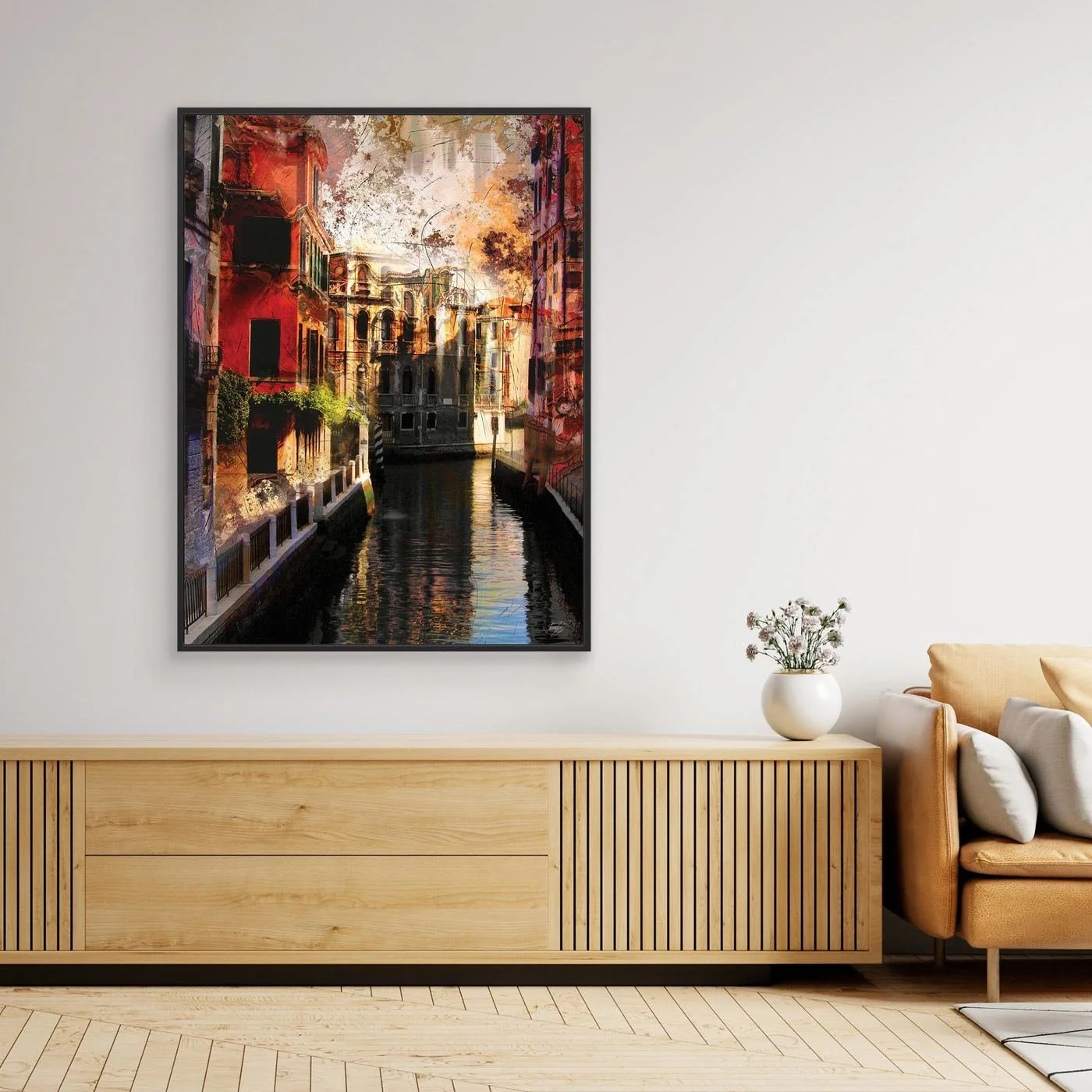 Abstract fine art print of a classic Venice canal landscape with heavy grunge textures, featuring historic architecture in vibrant red and gold tones, framed and ready to hang. Over wooden console