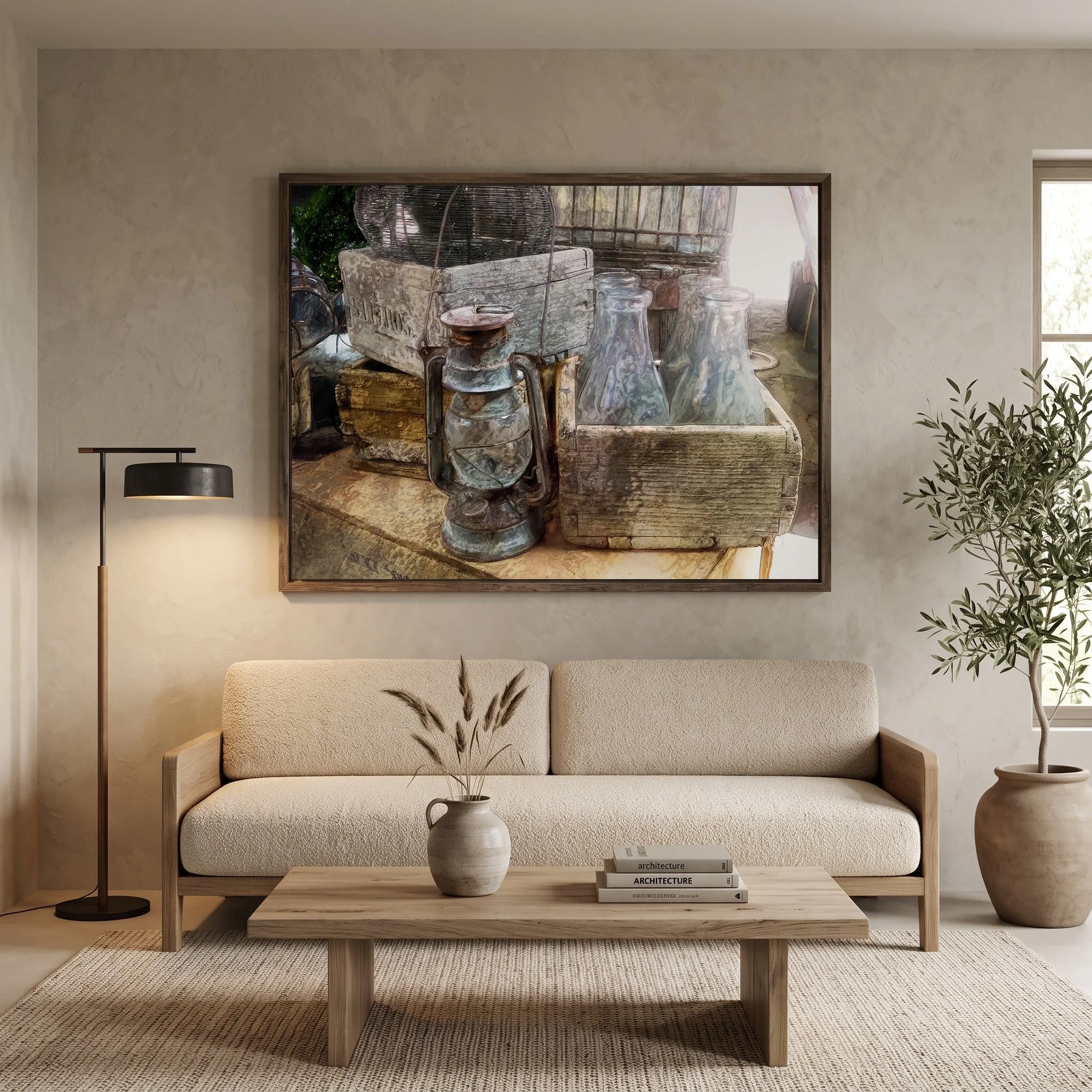 Large art fine art print hanging on a beige plaster wall in a bright Japandi living room with a cream sofa, wooden coffee table, and jute rug