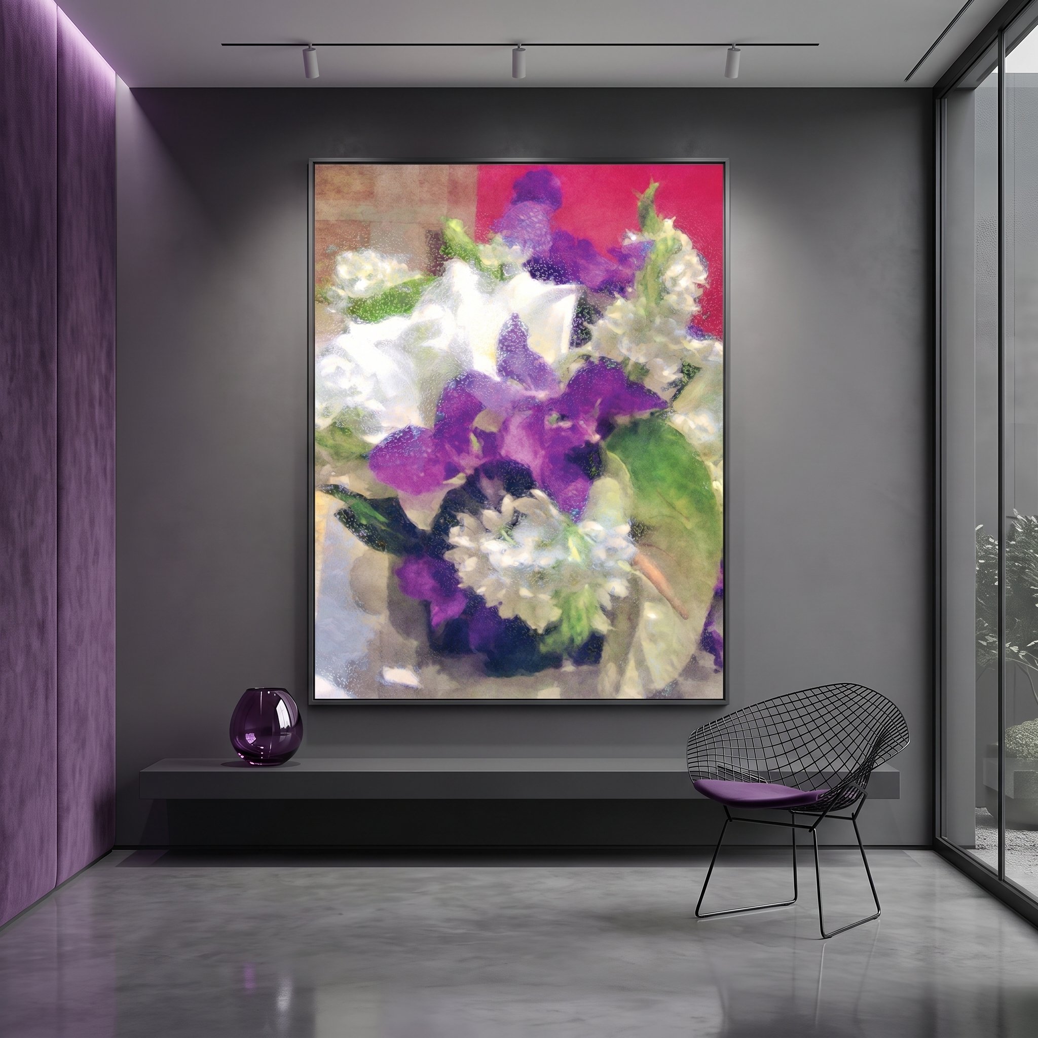 Canvas art with a textured purple floral motif hanging in a modern gallery space with concrete floors, a wire accent chair, a black bench, and track lighting.