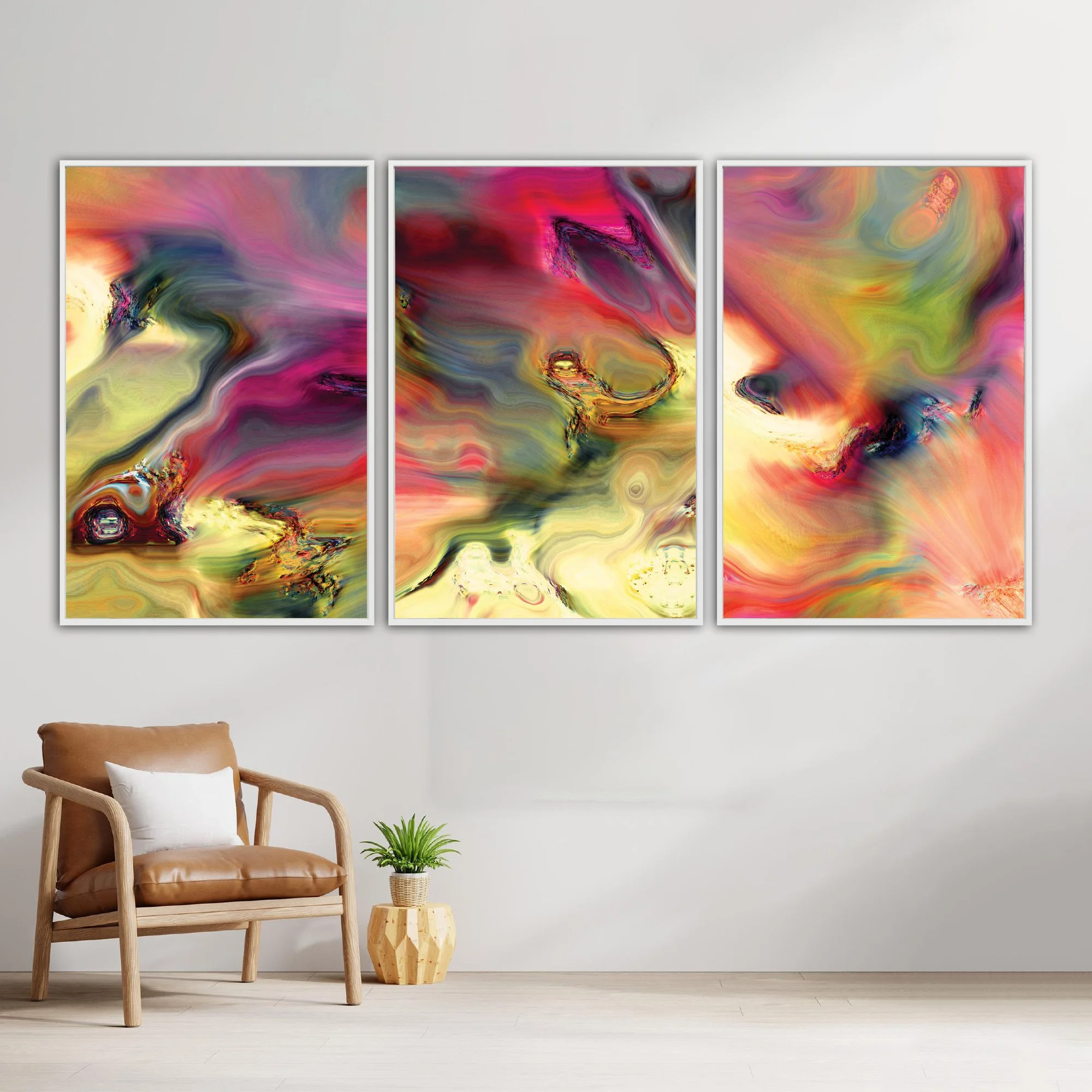 Abstract fine art triptych with swirling psychedelic liquid marble textures in vibrant magenta, ocher yellow, and wine red tones over a warm background, framed and ready to hang. With chair