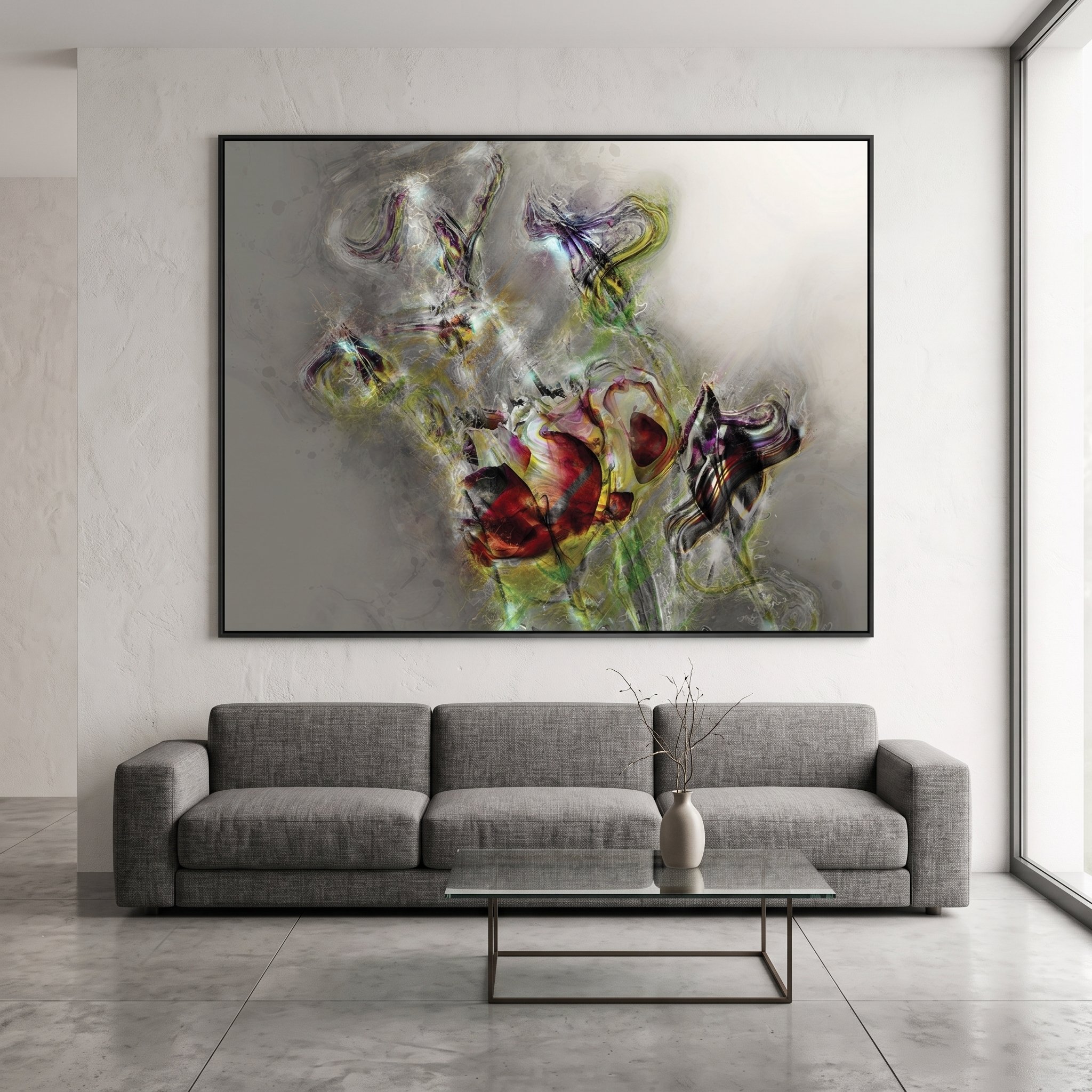 Large canvas art with a textured grey and red abstract design hanging above a grey sofa, featuring a minimalist glass coffee table and polished concrete floors.