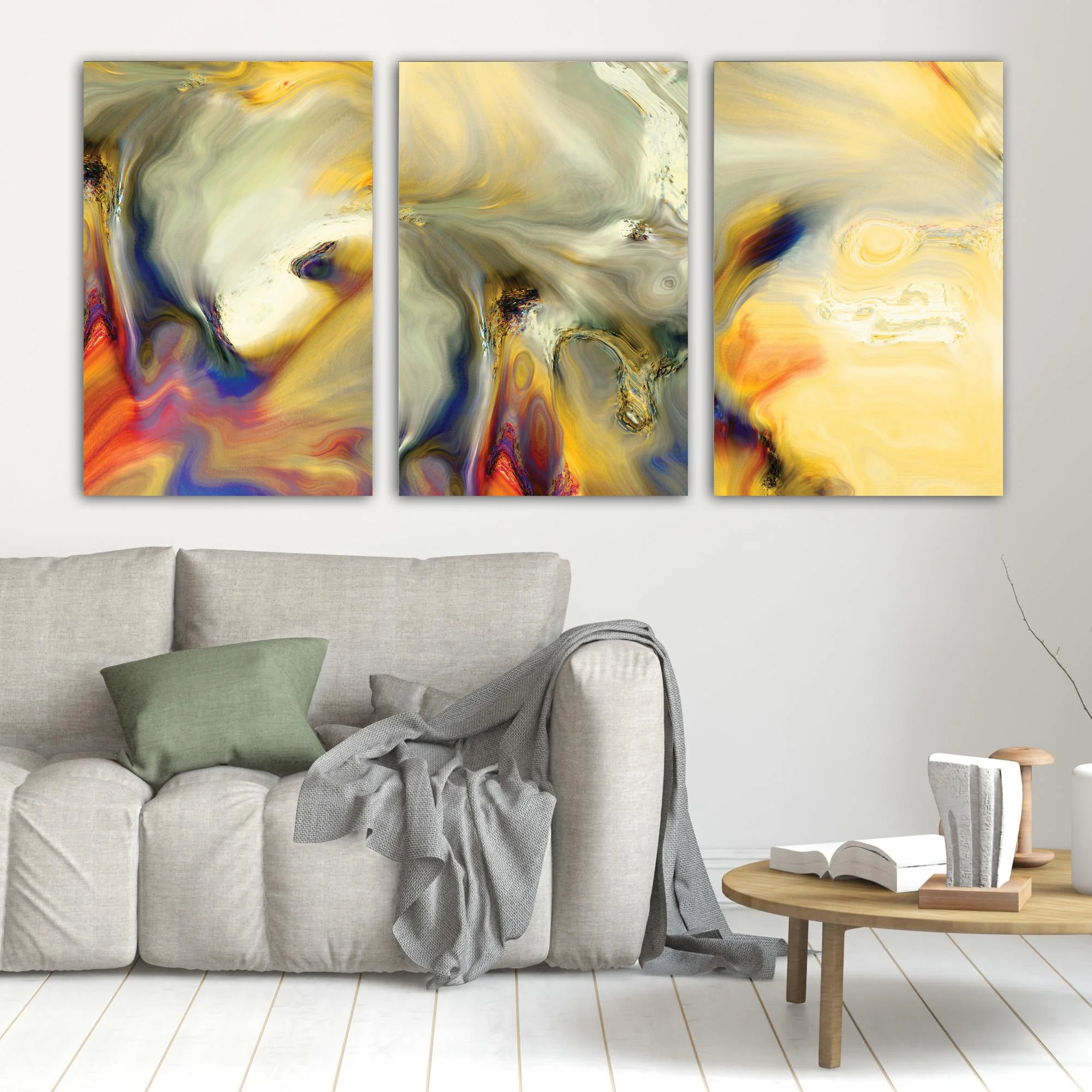 Abstract triptych with liquid textures in warm gold, ocher, and cream, contrasting with deep navy blue and terracotta swirls, framed and ready to hang. In living room