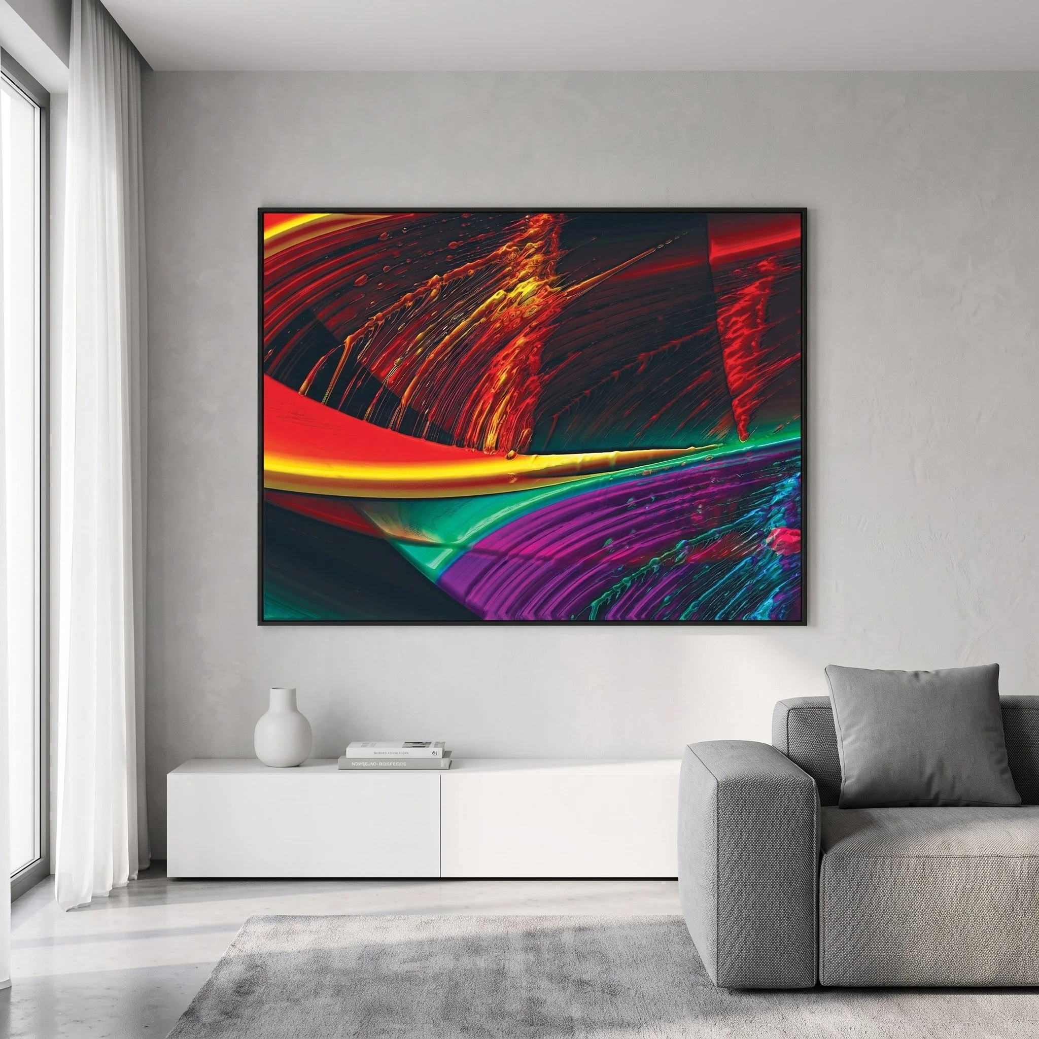 Large-format, colorful abstract painting hanging above a low white cabinet in a modern living room with a gray sofa and white curtains.
