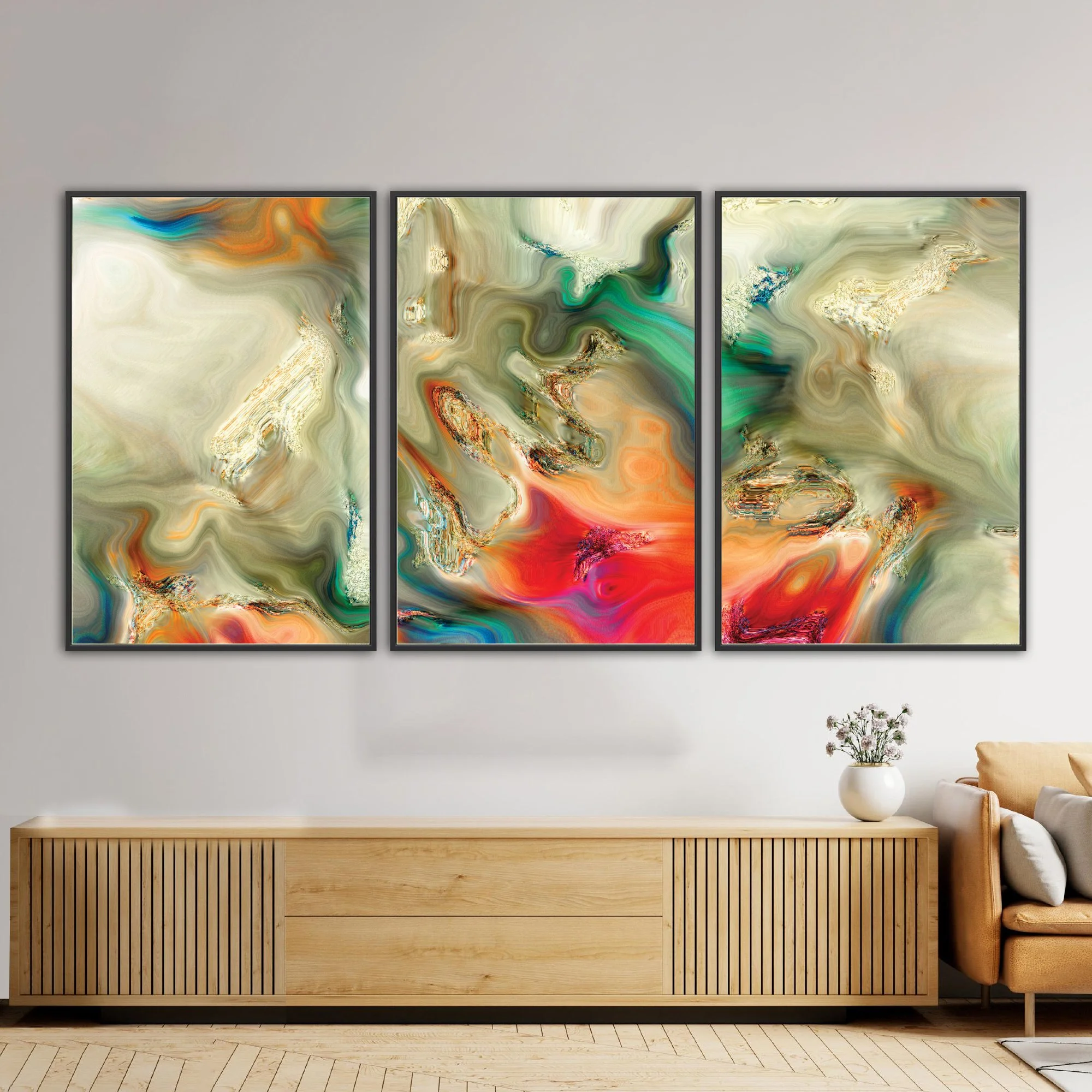 Abstract fine art triptych with liquid textures in earth tones, cream, and sage green, red and orange with metallic accents, framed and ready to hang. Over wooden console