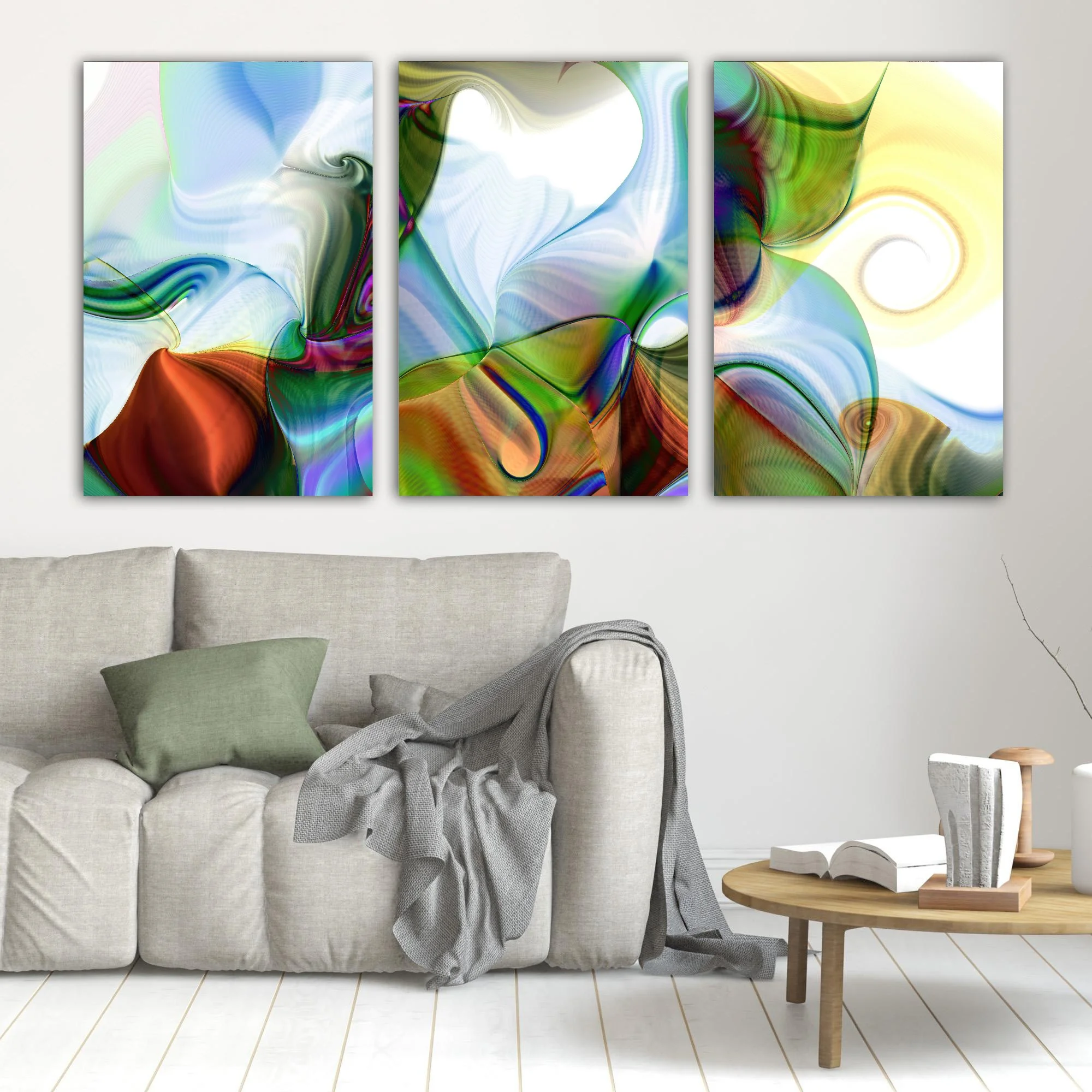 Abstract triptych with spiral patterns, line textures, and a color palette of forest green, sky blue, and warm earth tones over a white background, framed and ready to hang. In living room
