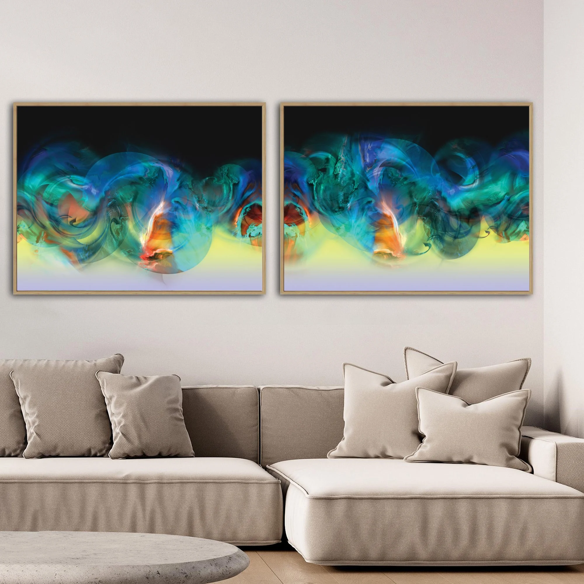 Abstract art diptych with swirling fluid shapes in vibrant blue, deep teal, and emerald green, with orange on black and yellow background, framed and ready to hang. Over grey couch