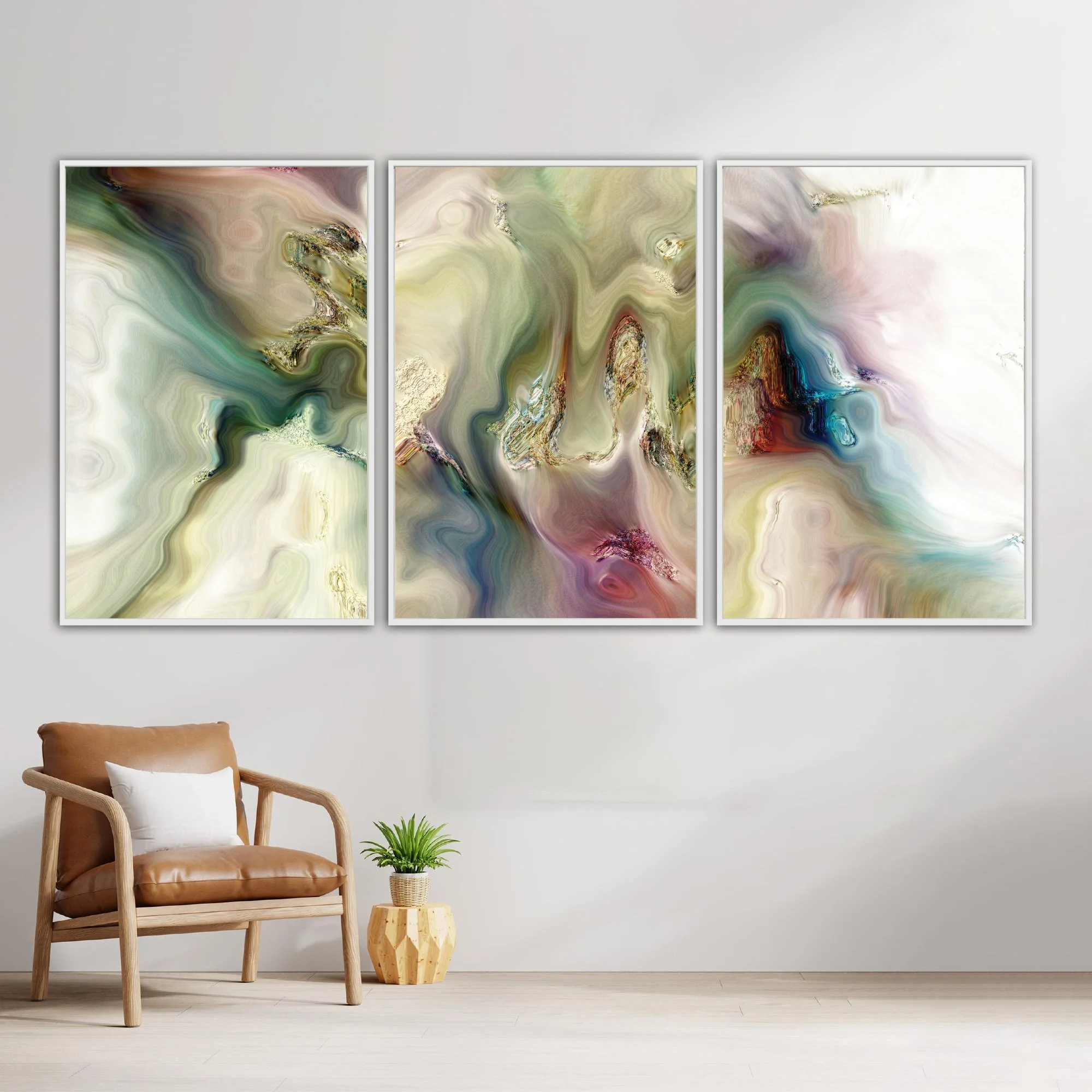 Abstract fine art triptych with marble textures and swirls in sage green, cream, and ocher tones with turquoise and violet highlights, framed and ready to hang. With chair