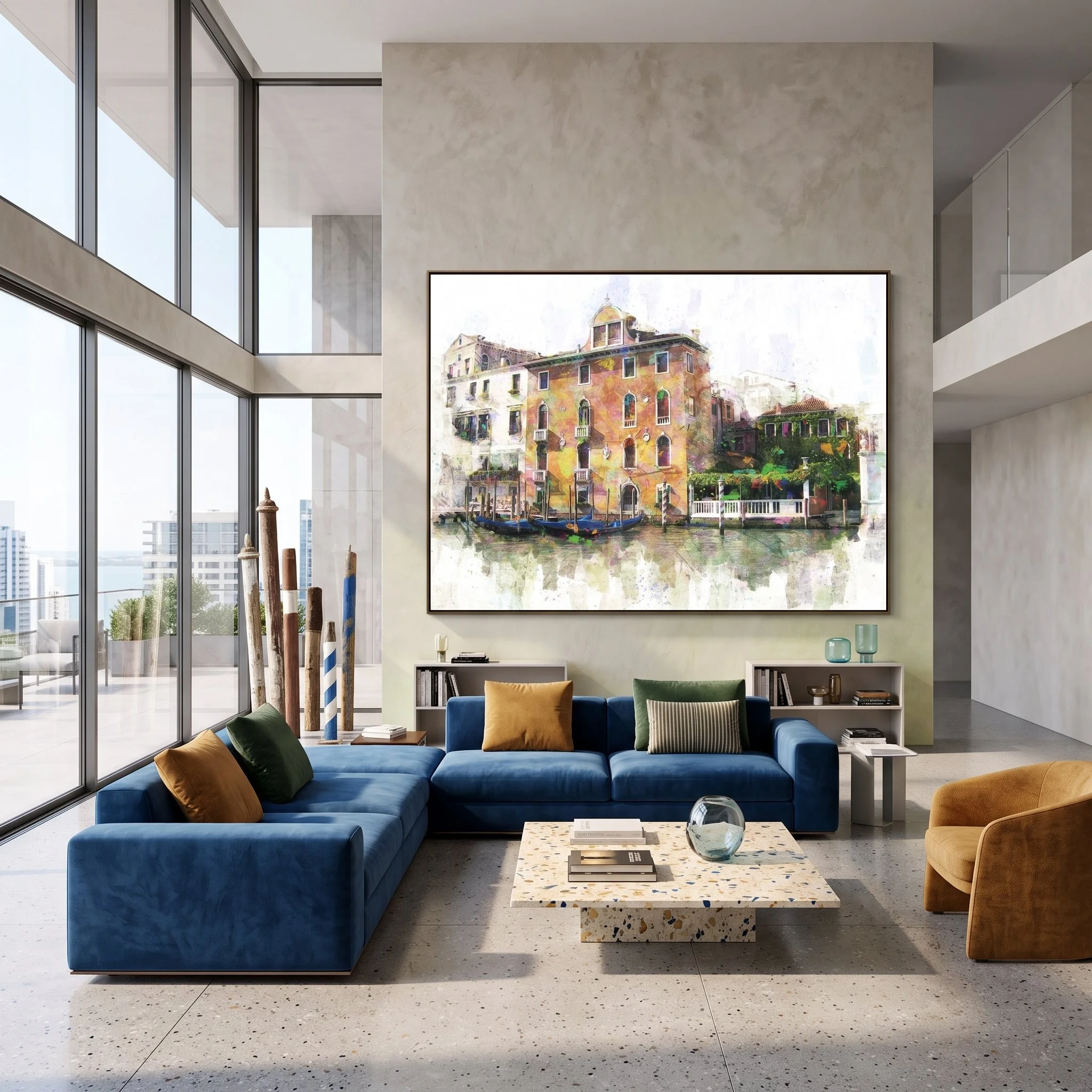 Large art fine art print of Venice hanging on a textured accent wall in a luxury double-height living room with a blue sectional sofa and terrazzo coffee table