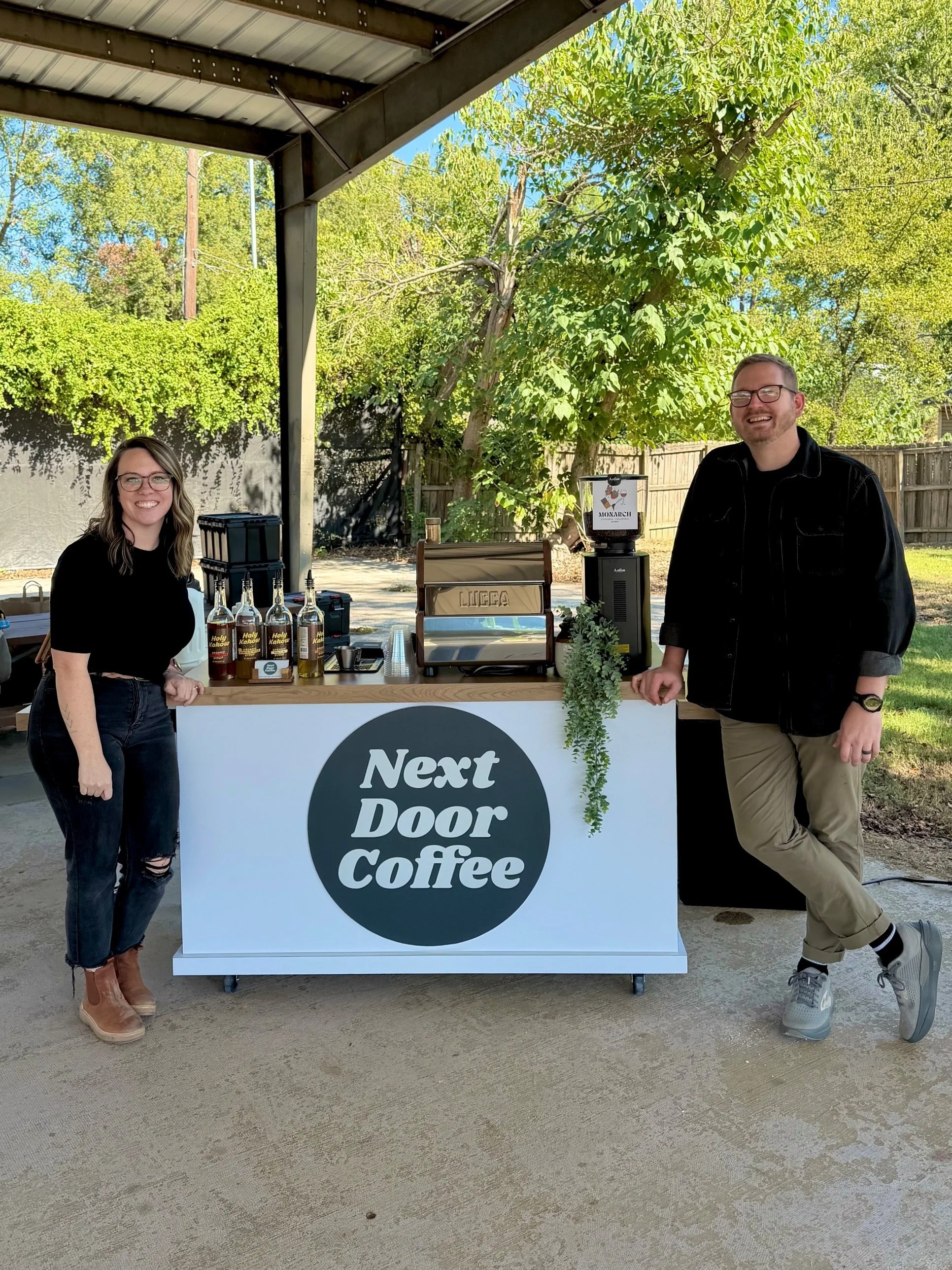 Next Door Coffee mobile espresso cart set up at a Central Arkansas event