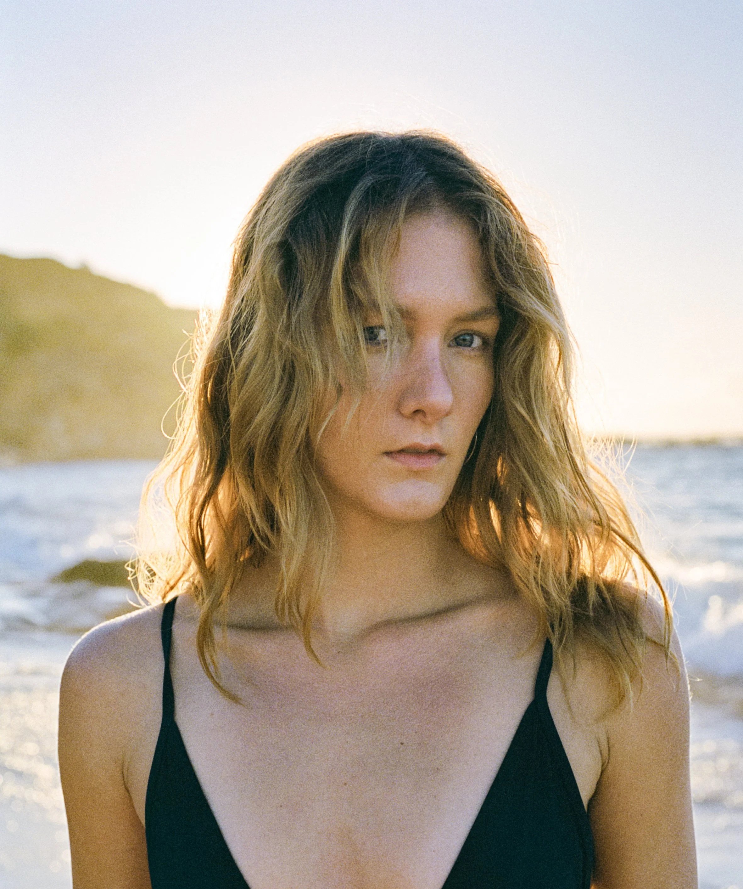 Barbora, founder of Casa Baba, on the beach in Manly