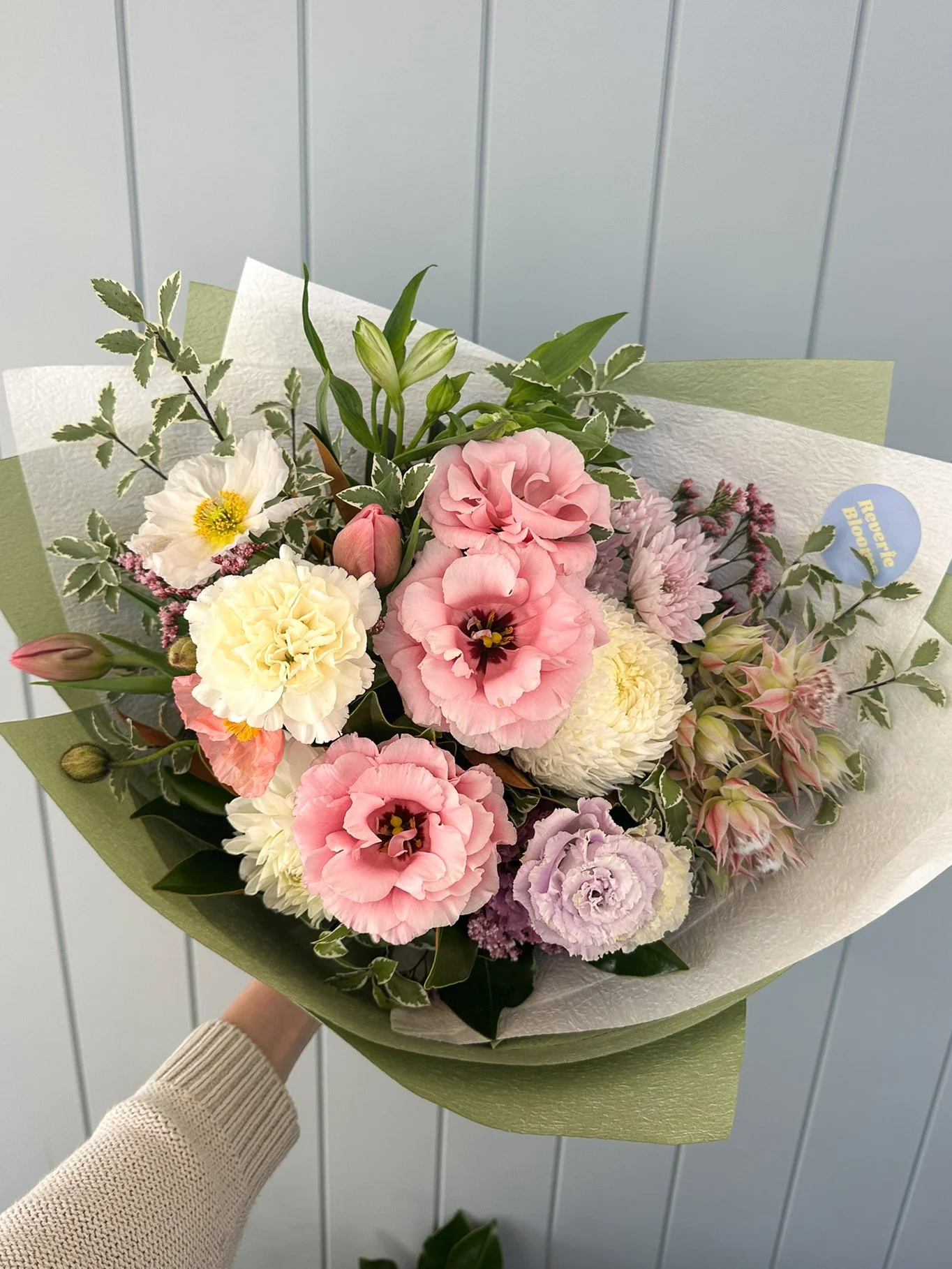 reverie-blooms-pink-lisianthus-white-mum-protea-wrap.jpg