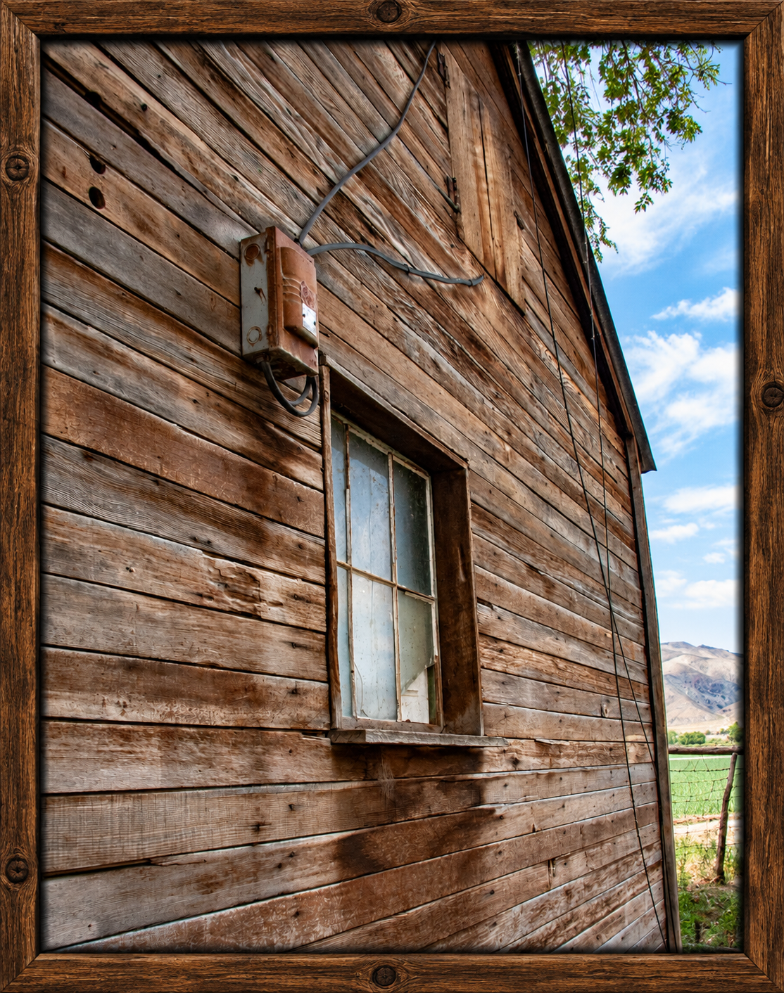 Rustic Barn Wall and Countryside View.png