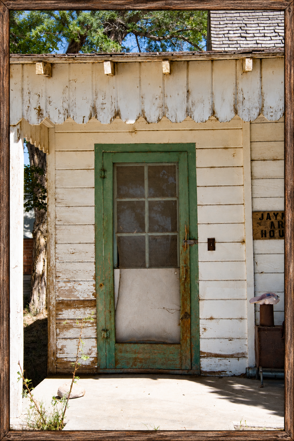 Weathered Green Doorway in Sunlight.png
