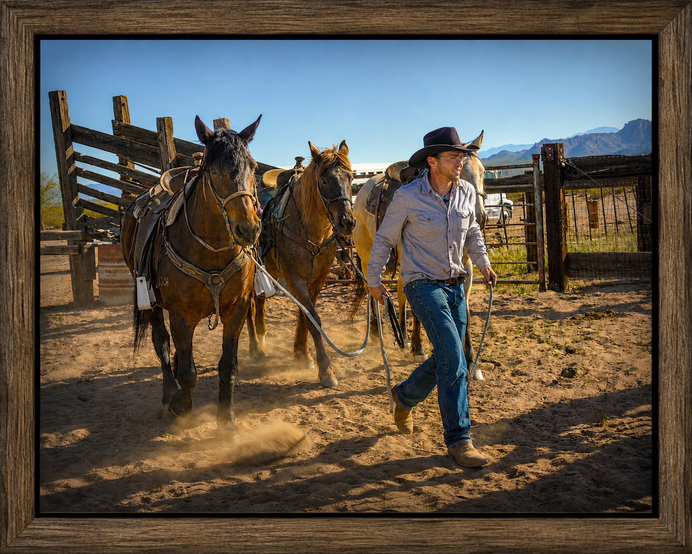Cowboy Leading Horses Through Dusty Corrals.png