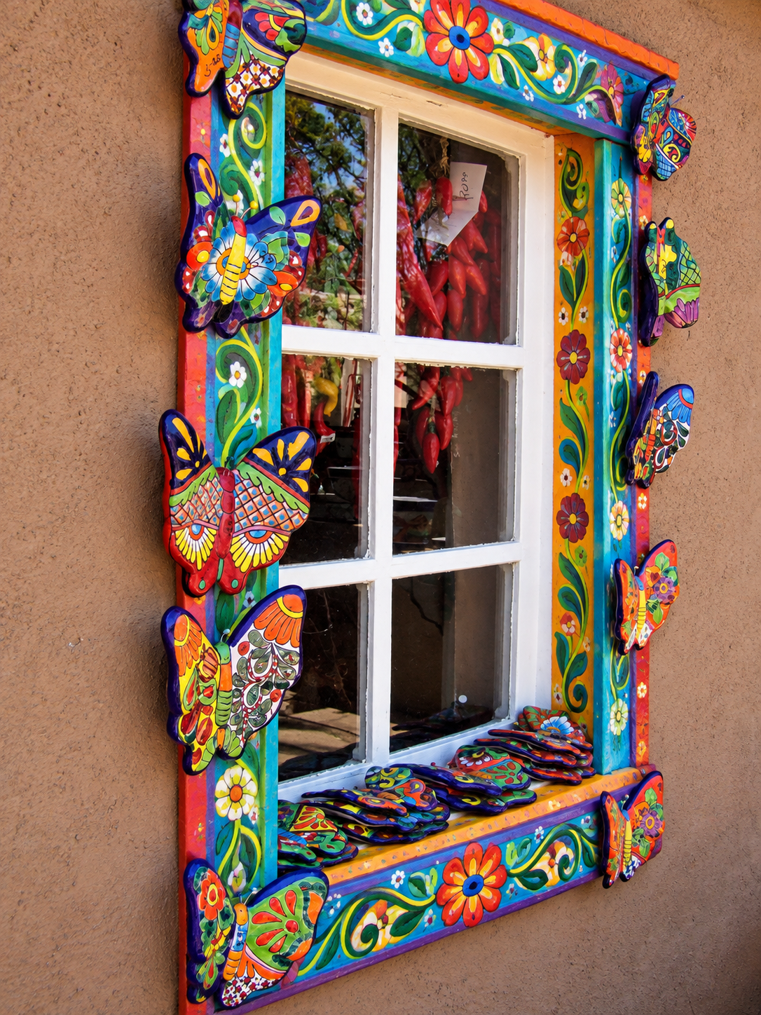 Whimsical Folk-Art Butterfly Window.png