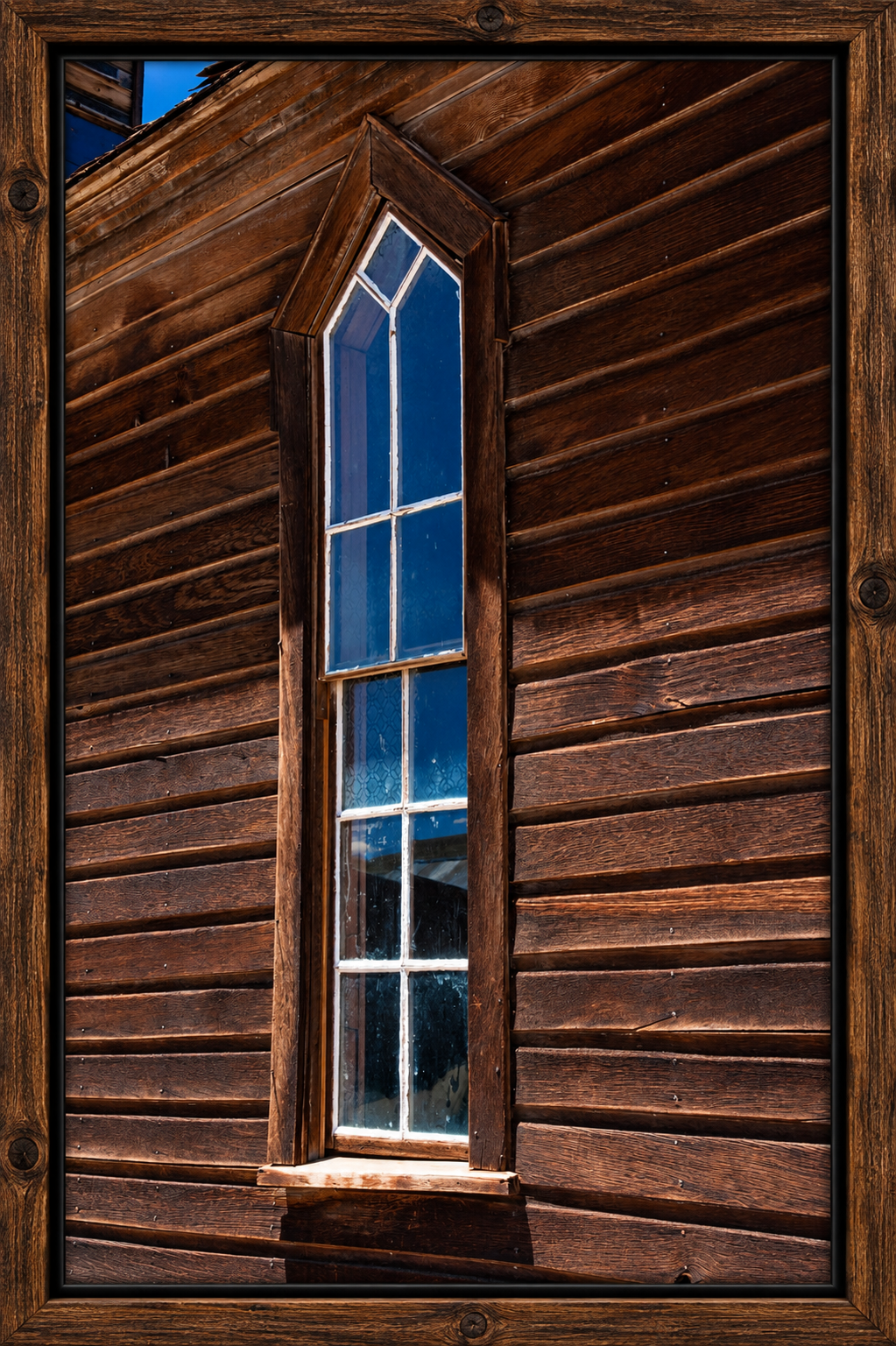 Framed Gothic Window in Weathered Wood.png