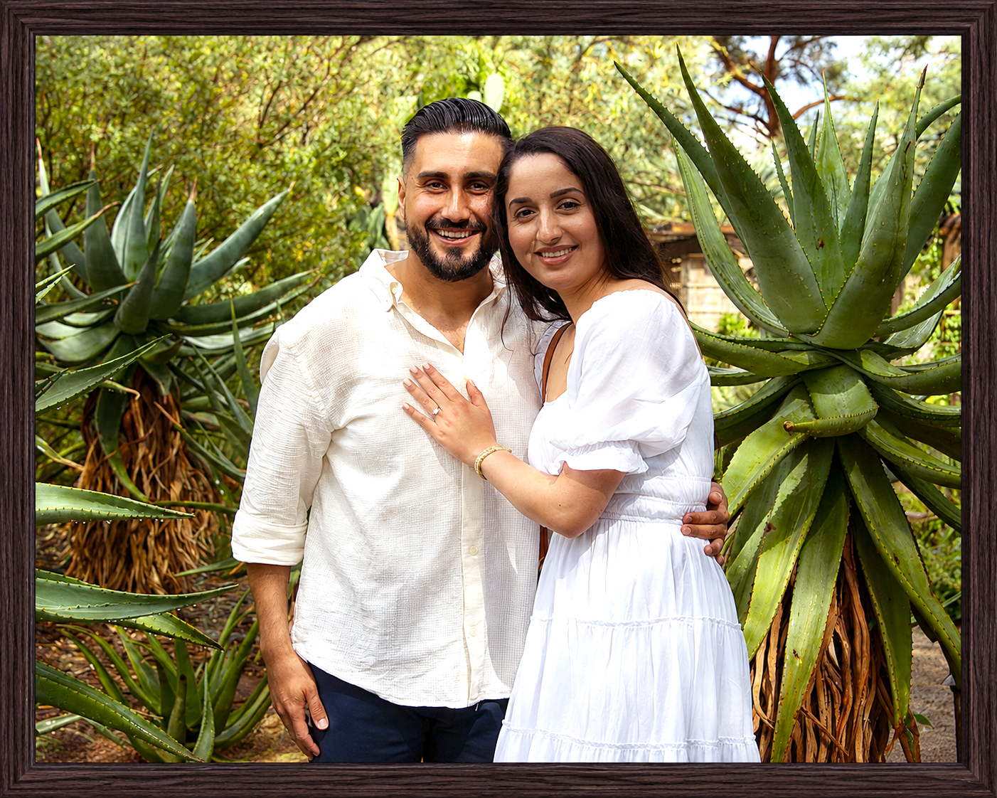 Framed Garden Portrait of a Smiling Couple.png