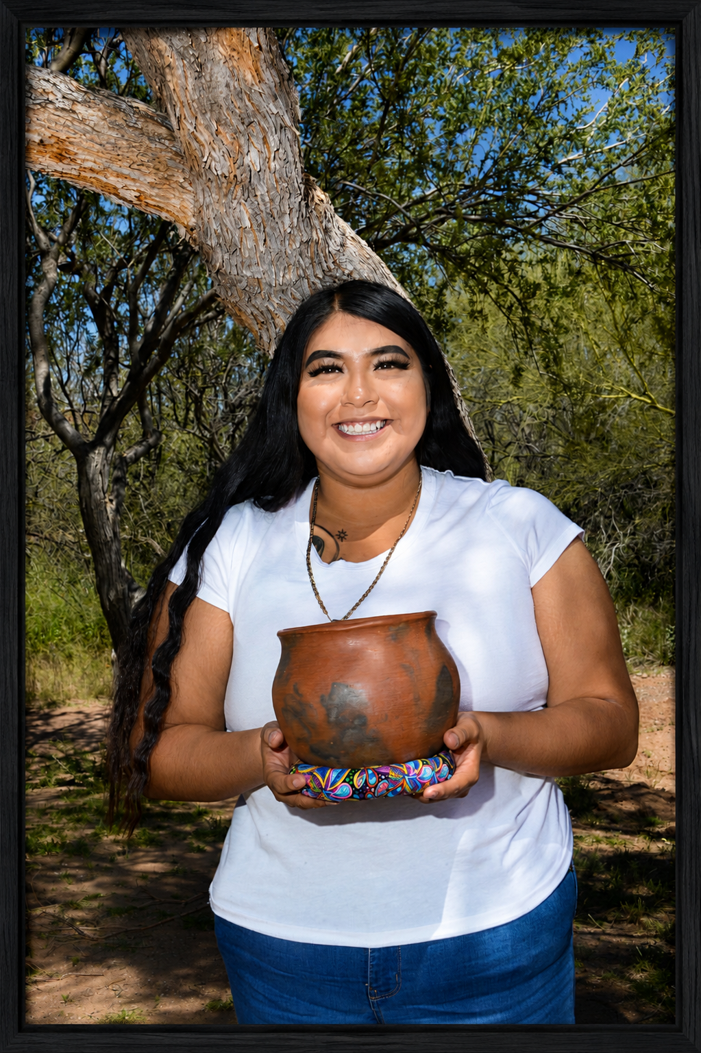 Framed Portrait with Clay Pot.png