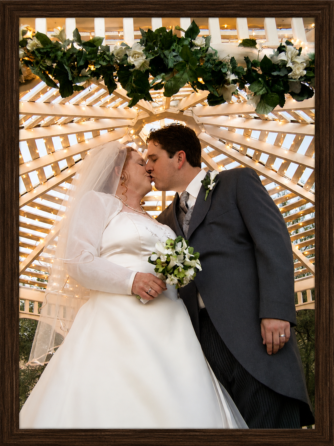 Romantic Gazebo Wedding Kiss.png