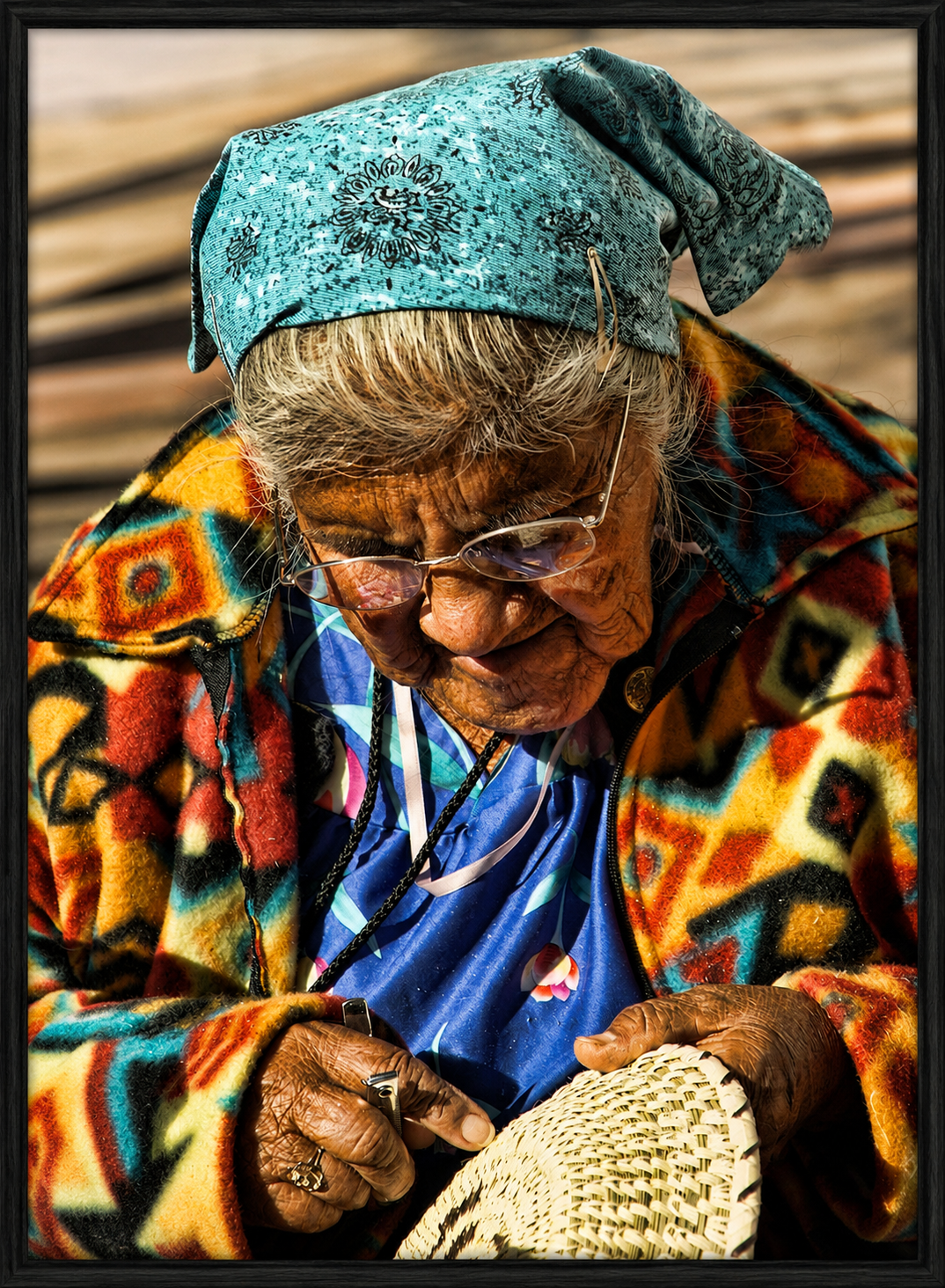 Elderly Artisan Weaving a Basket.png