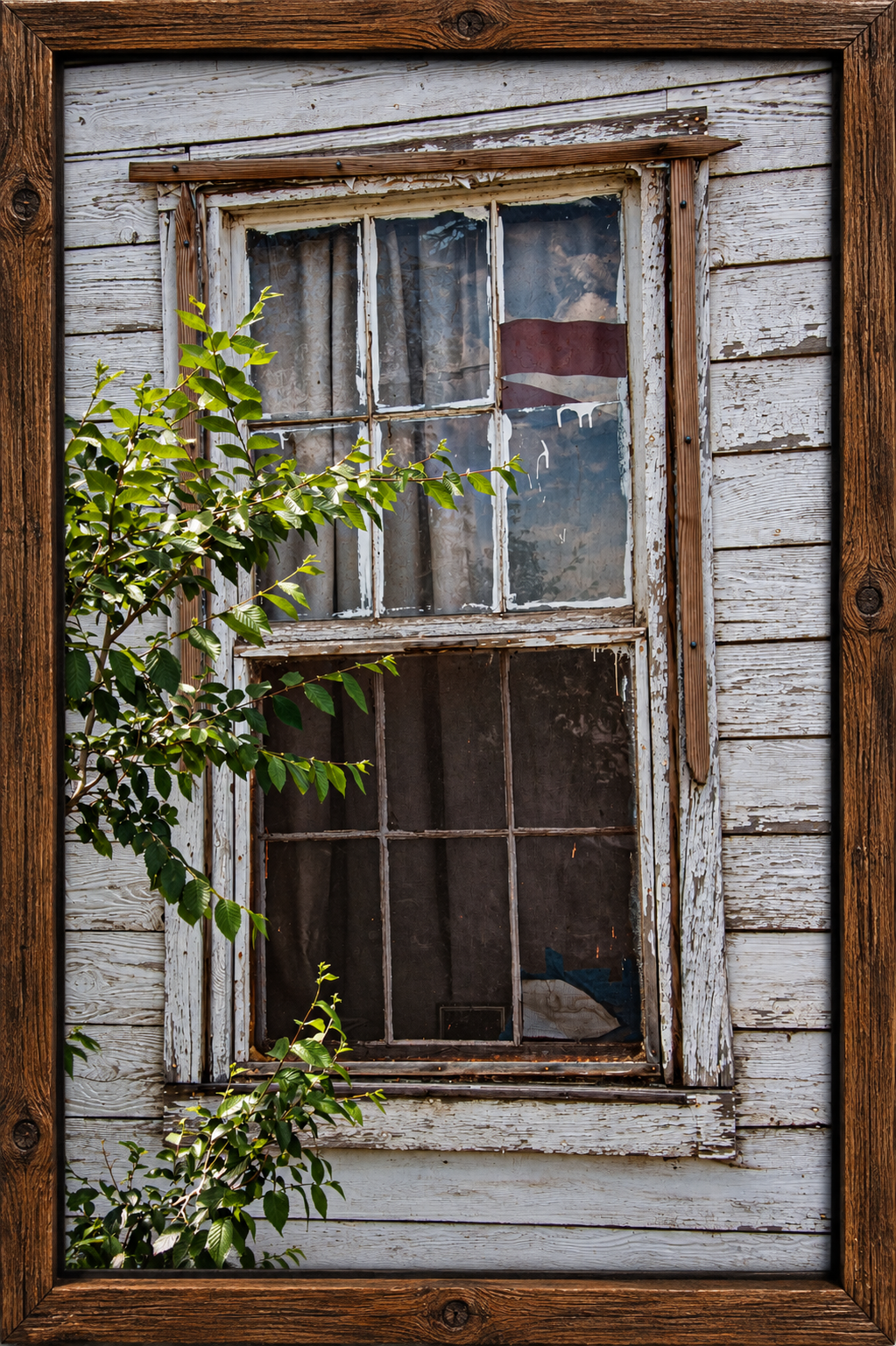 Weathered Window in Rustic Frame.png
