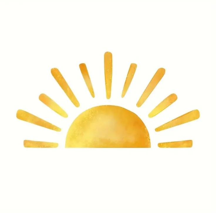 Sun rising over the horizon with stylized sun rays