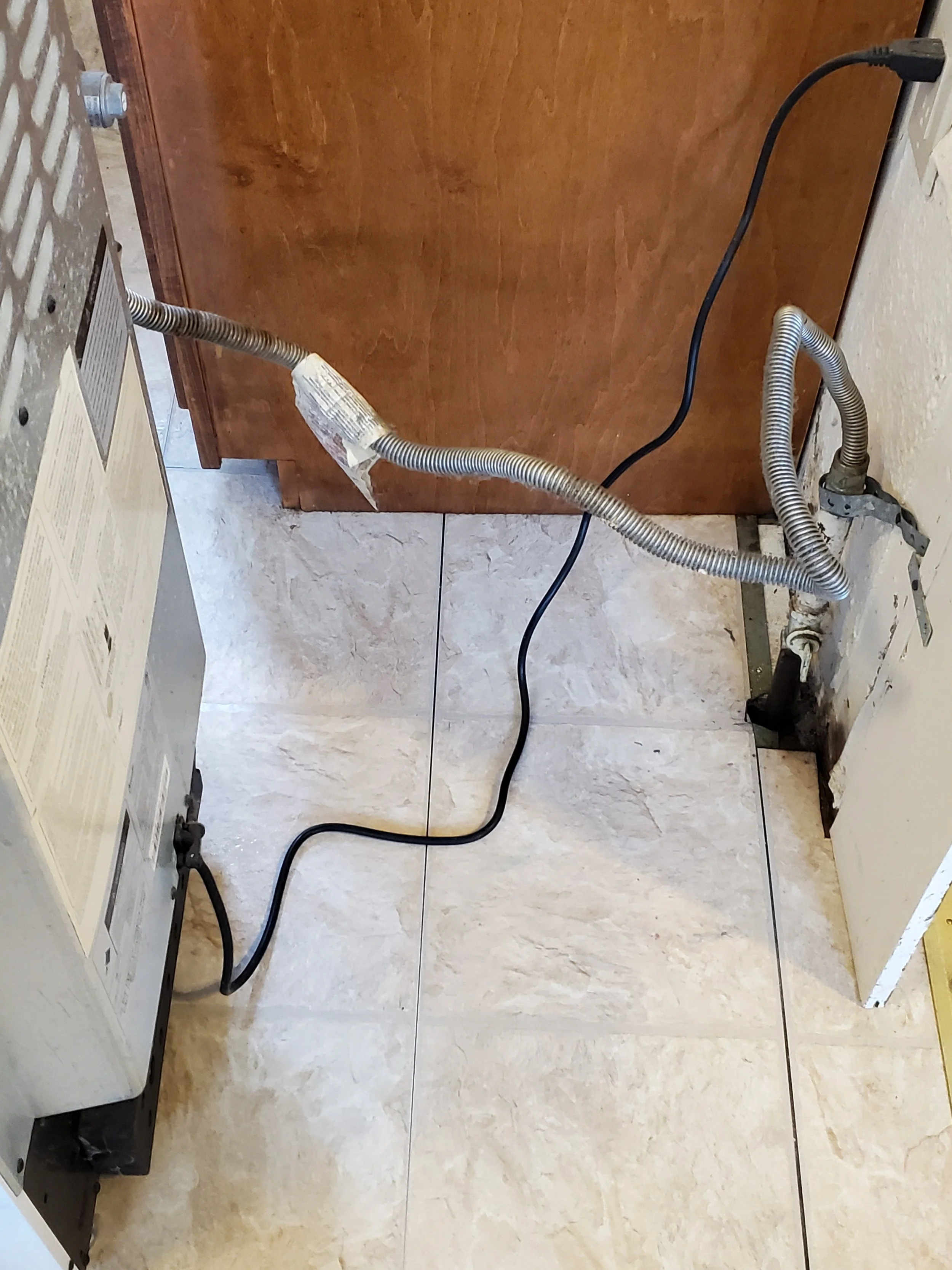 Floor behind stove after debris and dust cleaned - AFTER DEEP CLEANING