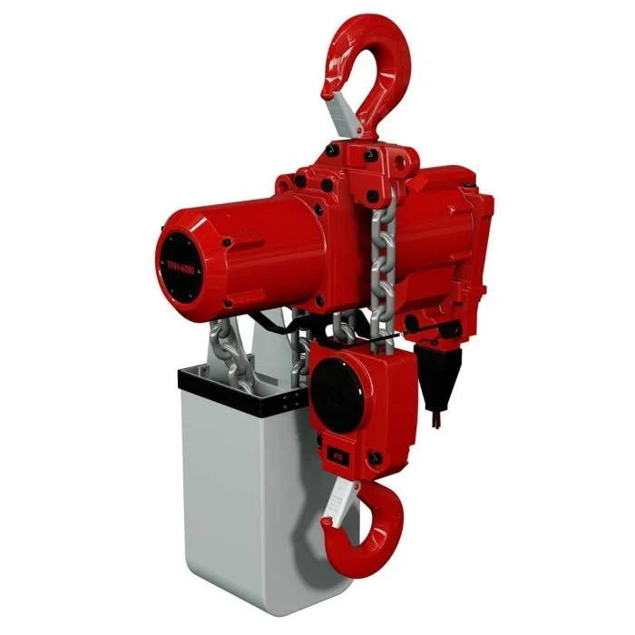 Gancio sollevatore industriale rosso collegato a un dispositivo di sicurezza in metallo e plastica