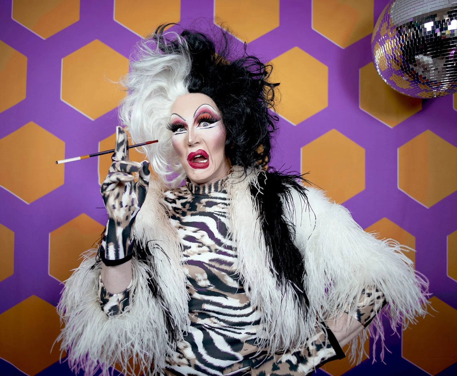Charlie Hides hosting a live Virtual Halloween Bingo for Work event for remote and hybrid teams.