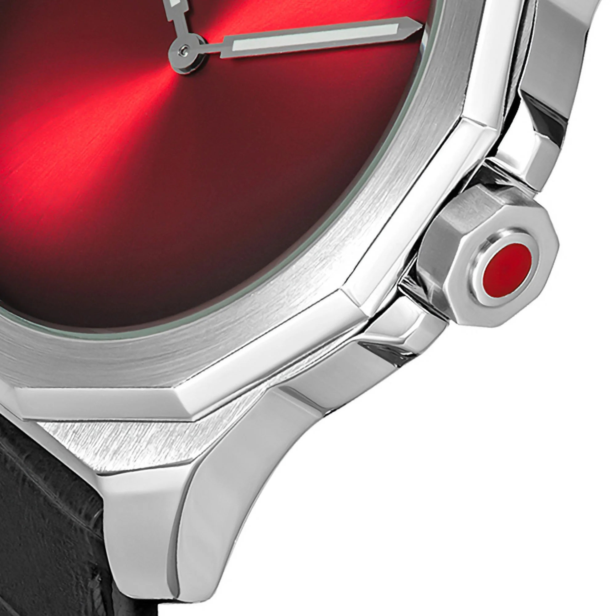 Close-up of a wristwatch with a red dial, silver case, and metallic band, showing the hands and part of the bezel.