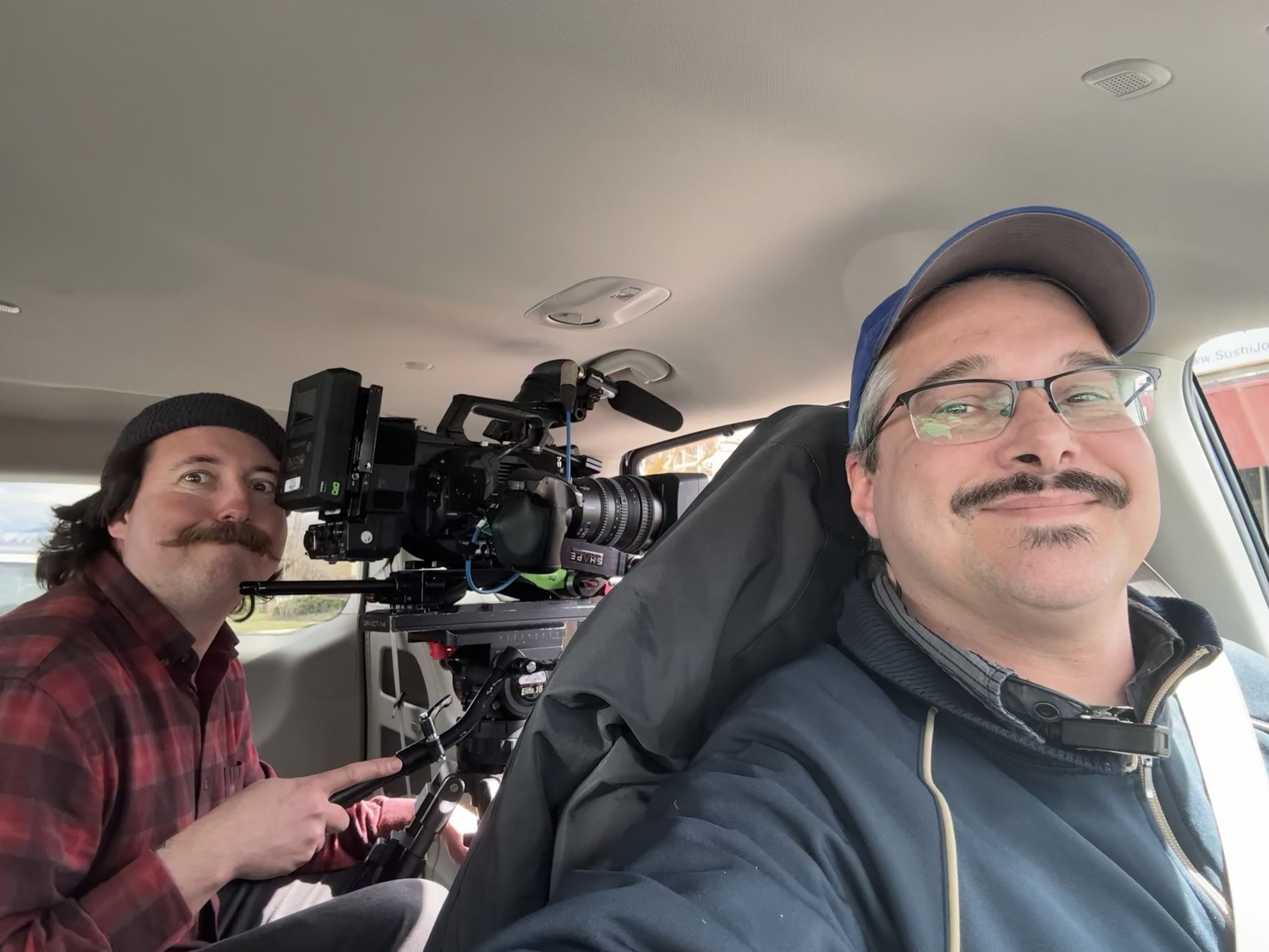 Seth Randal (R) working as part of a network field crew.
