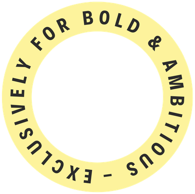 A circular beige badge with black text that reads, 'EXCLUSIVELY FOR BOLD & AMBITIOUS- EXCLUSIVELY FOR BOLD & AMBITIOUS'.