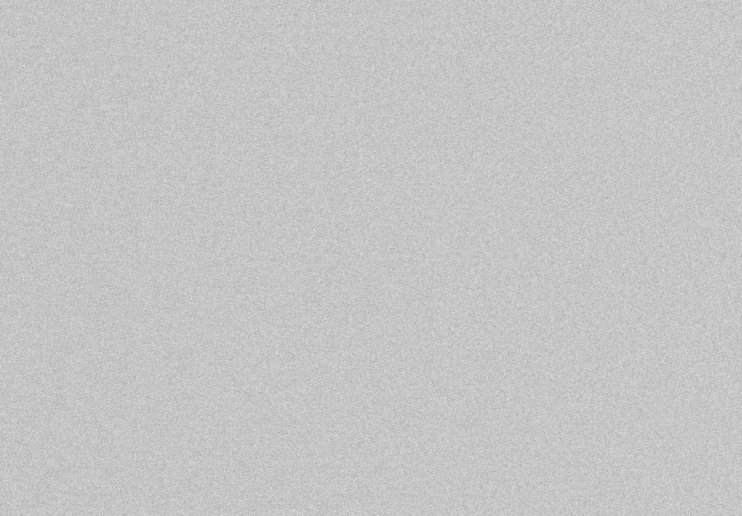 Cette image montre principalement un fond gris uni, très semblable à un motif de bruit électronique ou à une texture de sable fin, sans objets ni éléments distincts.