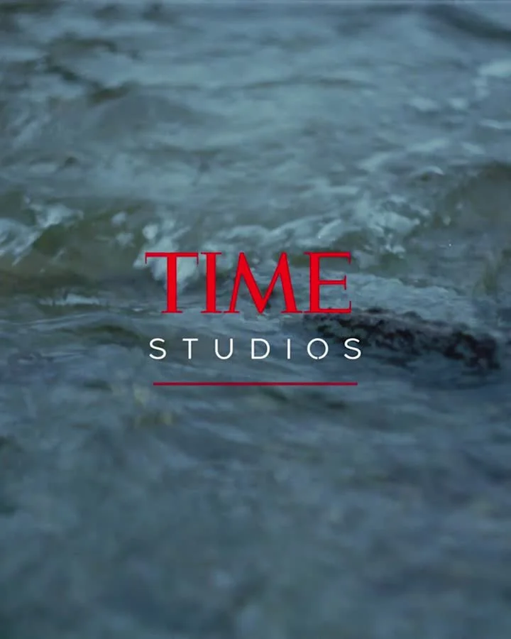 The image shows the logo of TIME Studios over a background of ocean water with waves.