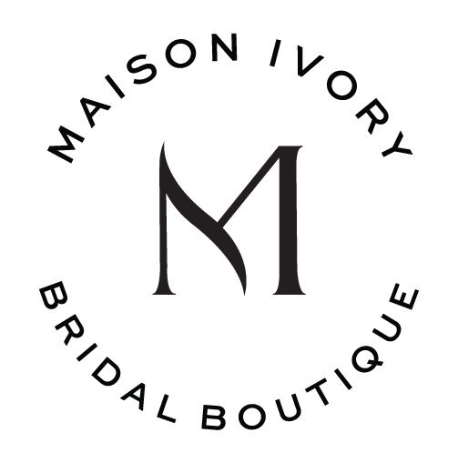A black logo with a large letter 'M' in the center, the words 'Maison Ivory' curved along the top, and 'Bridal Boutique' curved along the bottom.