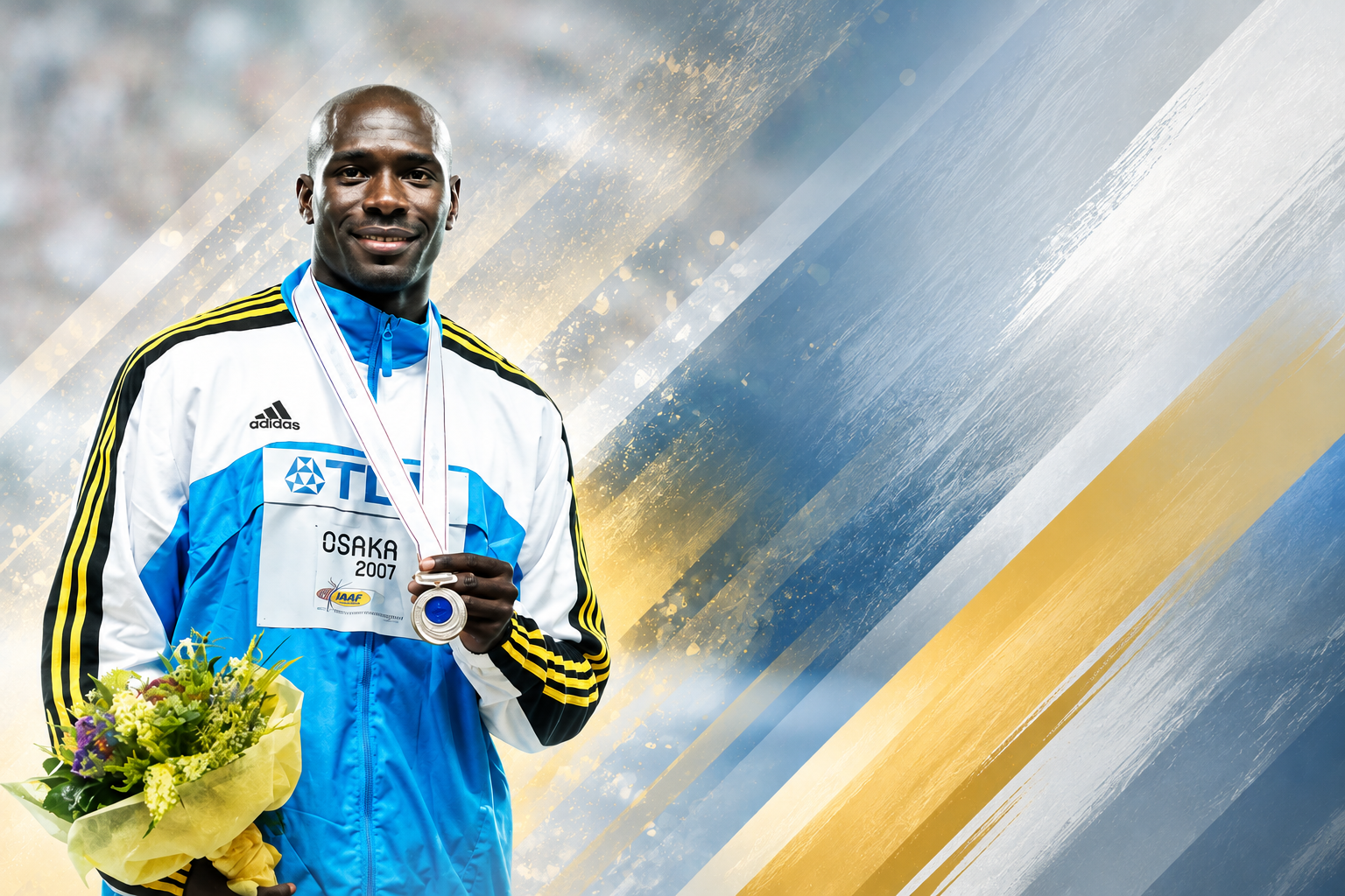A male athlete with dark skin holding a bouquet of flowers, wearing a medal around his neck, and dressed in a blue and white sports jacket. He is smiling and standing in front of a colorful abstract background.