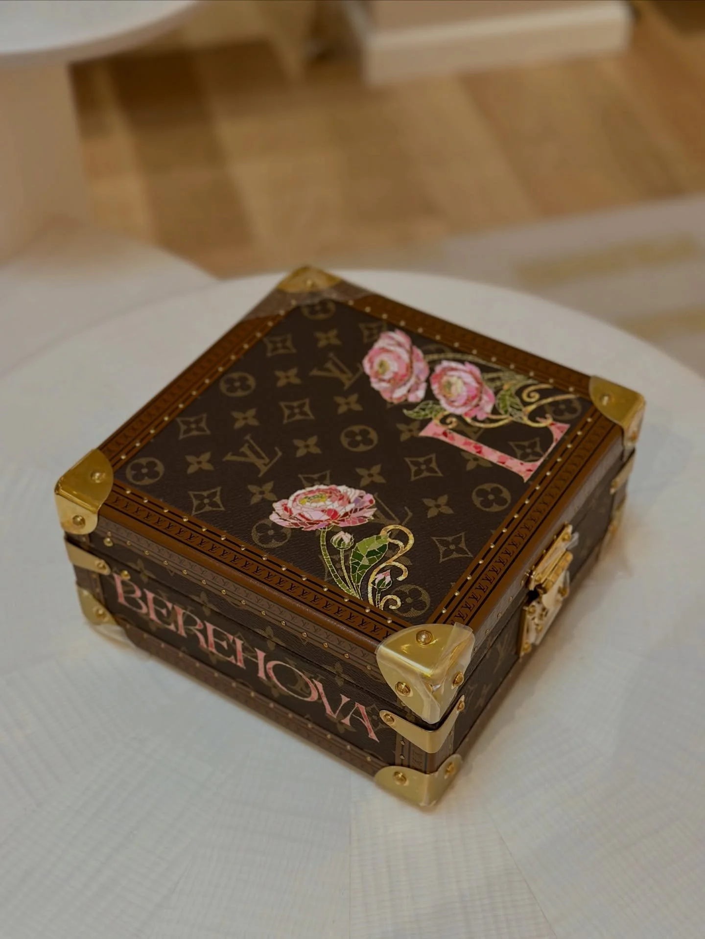 Florals and surname, both inspired by Barcelona&rsquo;s mosaics and the client&rsquo;s favorite flowers.