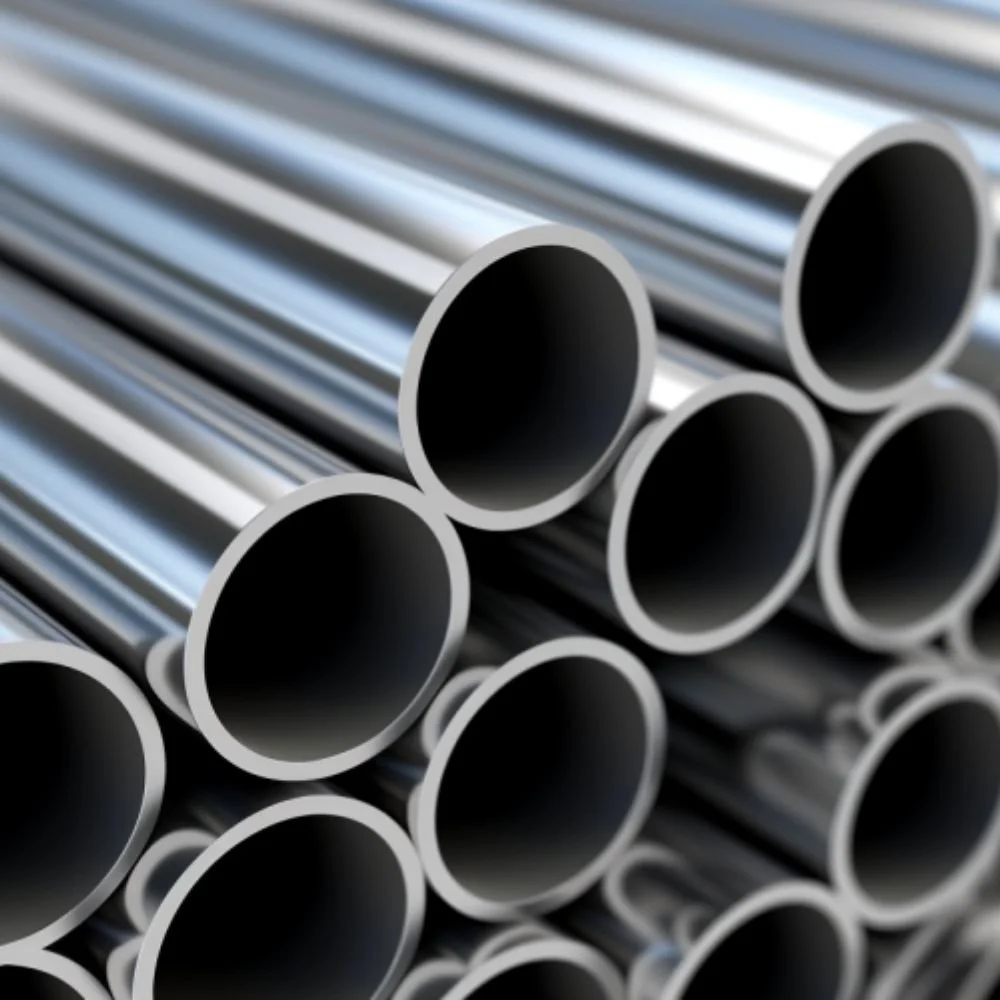 A close-up of shiny, horizontally stacked metal pipes with black interior.