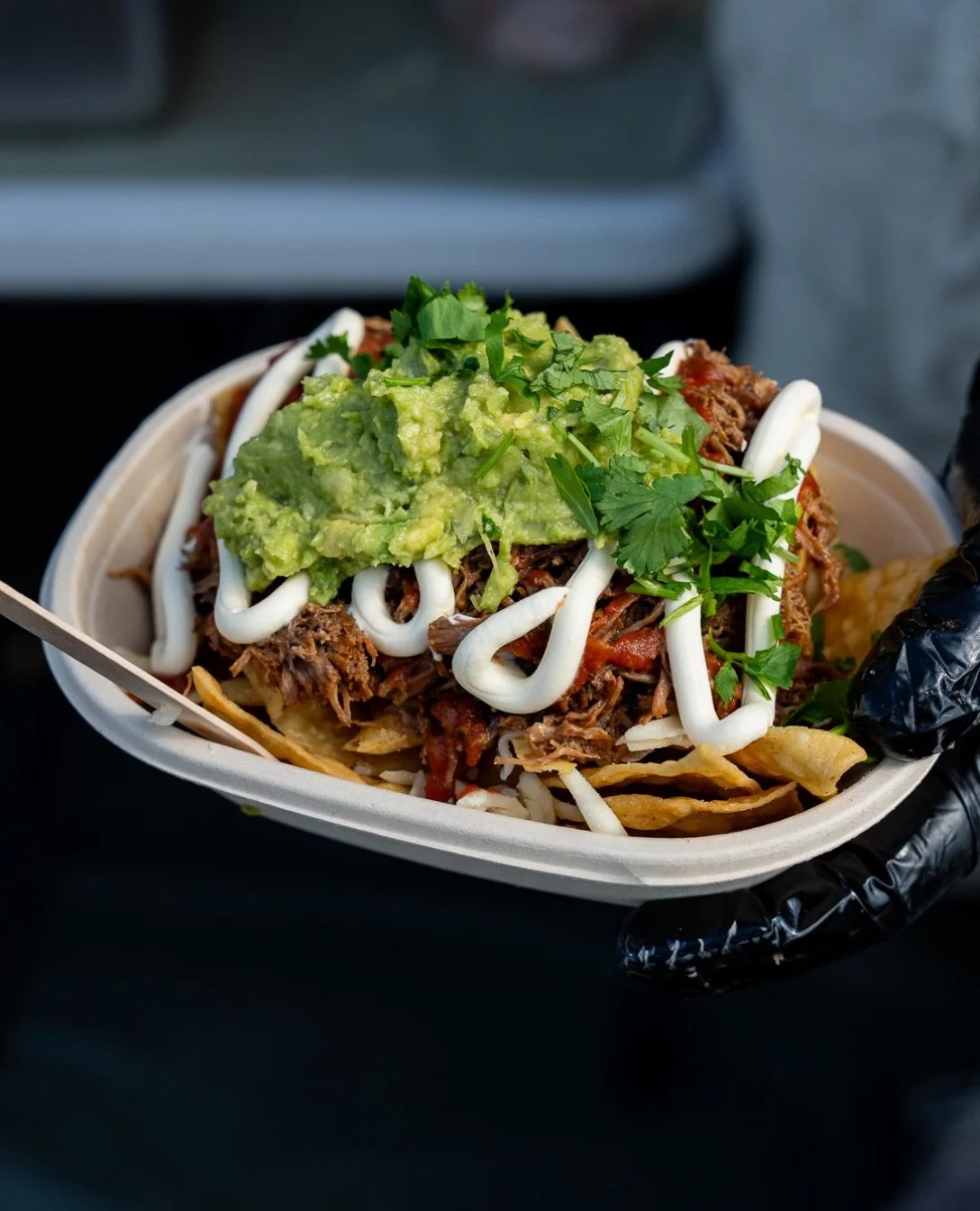 Birria Nachos 

Authentic corn chips lay the foundation &mdash; courtesy of @fireworksfoodsaus 

Loaded with cheese, brisket, salsa, sour cream &amp; guacamole!