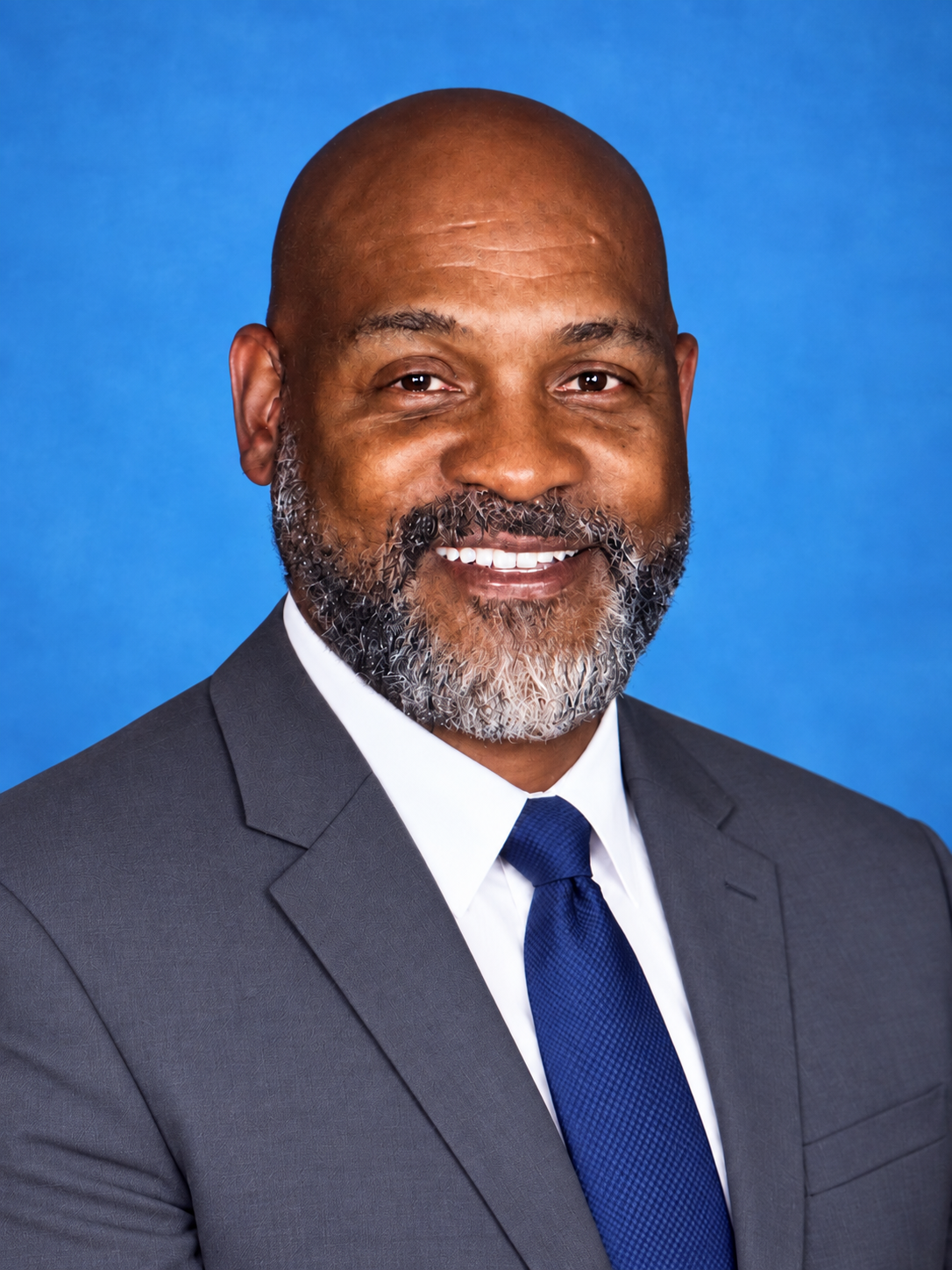 Professional portrait of Darrick Bell, founder and educational consultant.