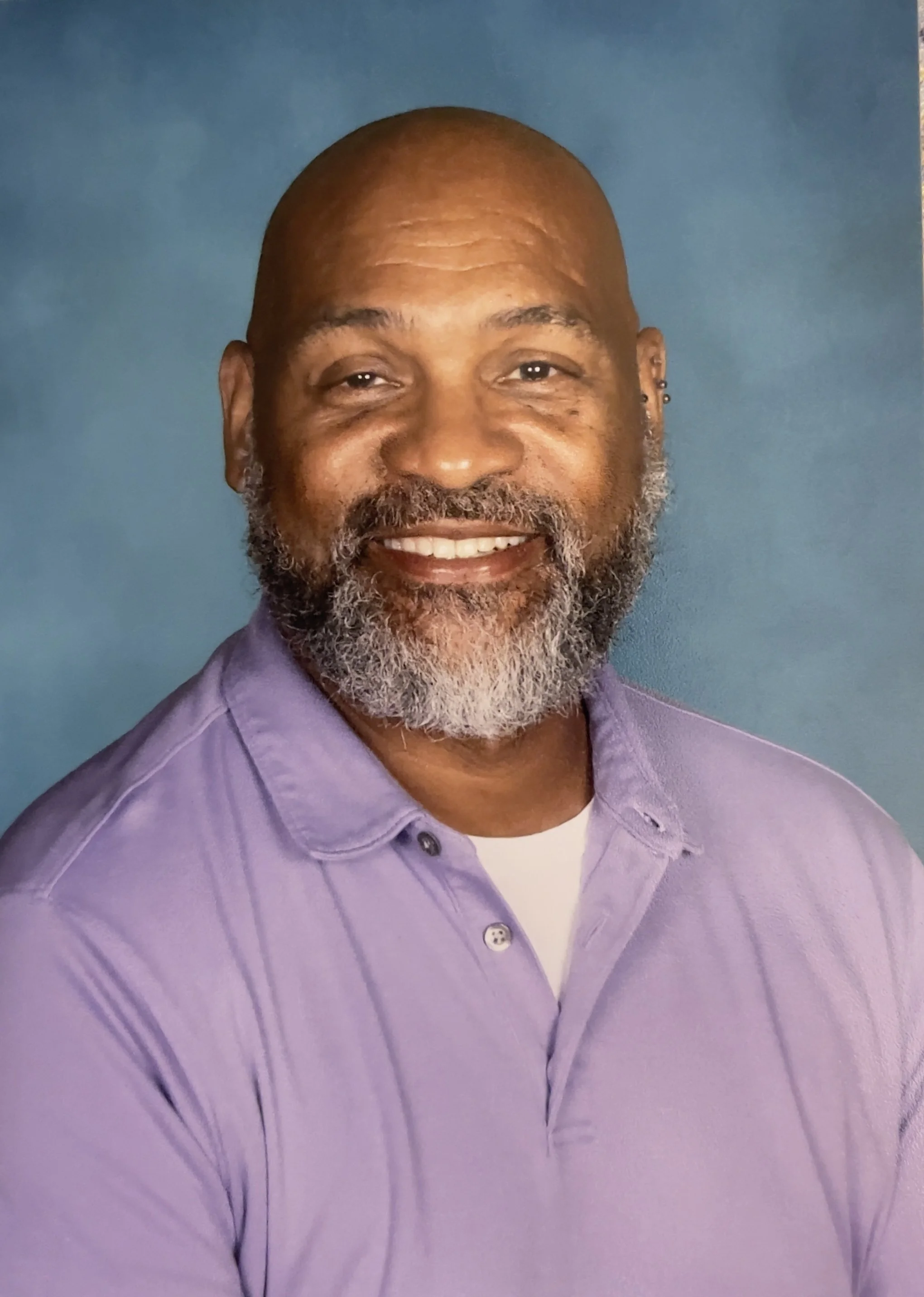 Professional portrait of Darrick Bell, founder and educational consultant.