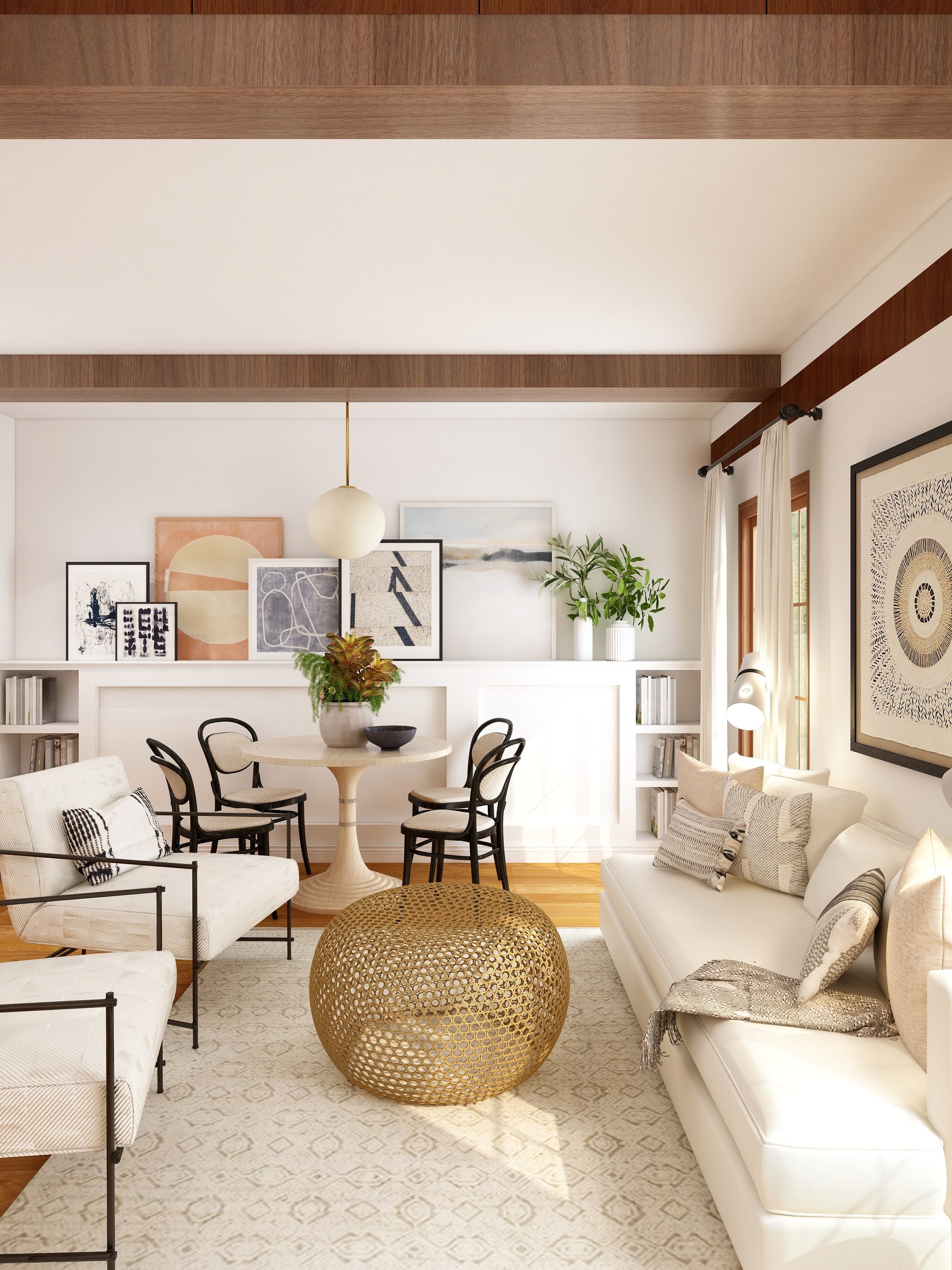 Living room with white couches, black chairs around a round table, wall art, potted plants, and a large patterned rug.