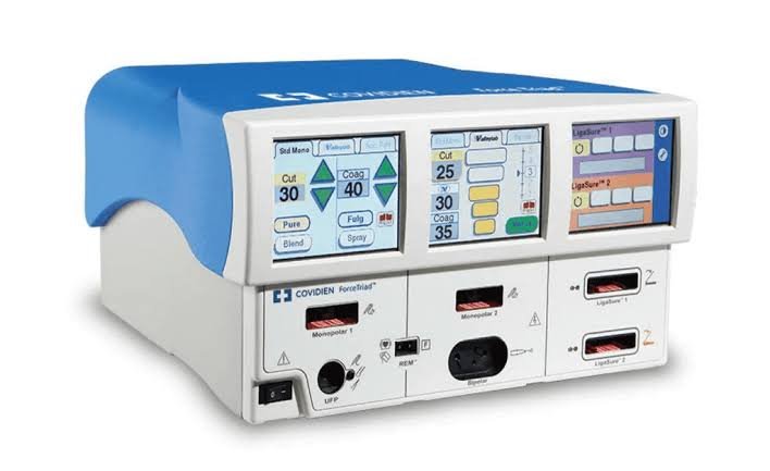 Medical device with digital screens and controls for surgical procedures, labeled with various settings and buttons.