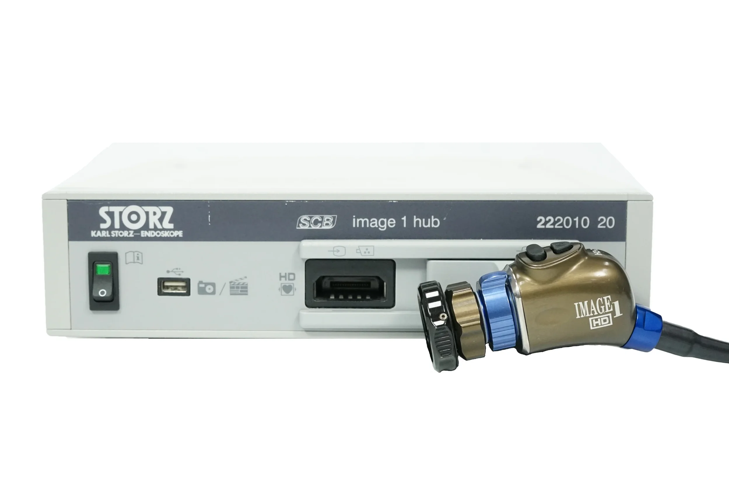 Medical endoscopy equipment, including a box labeled 'Storz Karl Storz Endoscope', a controller, and a device labeled 'Image 1 HD' with various connectors, used for visual examination inside the body.