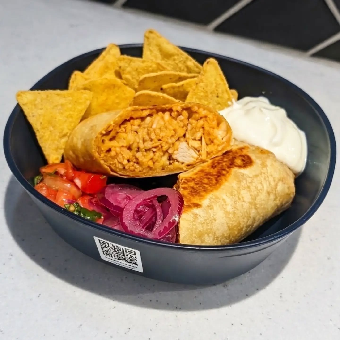 Masafina Chicken Tinga Burrito! 🌯😋

Today on Oliver's Grill! 📍

Served in our reusable Caulibox takeaway container 🥣♻️

📲 Scan &rarr; eat &rarr; return &rarr; earn! 🪙

Every Caulibox return gets you CauliCoins to redeem for FREE meals &amp; cof