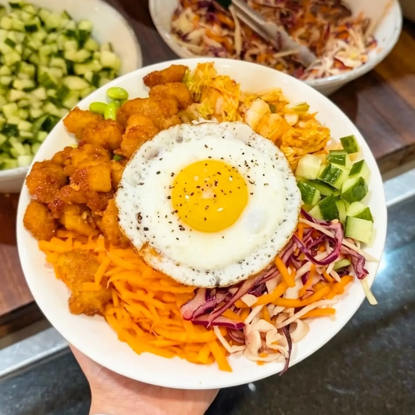 🔥Bibimbap on Bamboo Bike!🍜🍚

Crispy Korean glazed chicken rice bowl topped with slaw, cucumber, carrot, kimchi, edamame, crispy onions and a jammy fried egg. 🍳

Add chilli sauce or Sriracha if you're feeling brave 🔥😋

Only in Oliver's Restauran